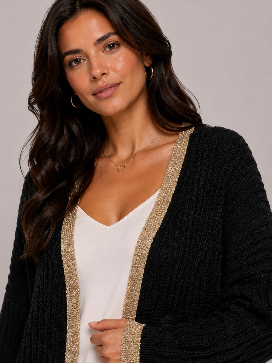 Ladies Italian edge to edge knitted cardigan in black with gold trim, soft ribbed knit open front cardigan for women, stylish lightweight layering knitwear.