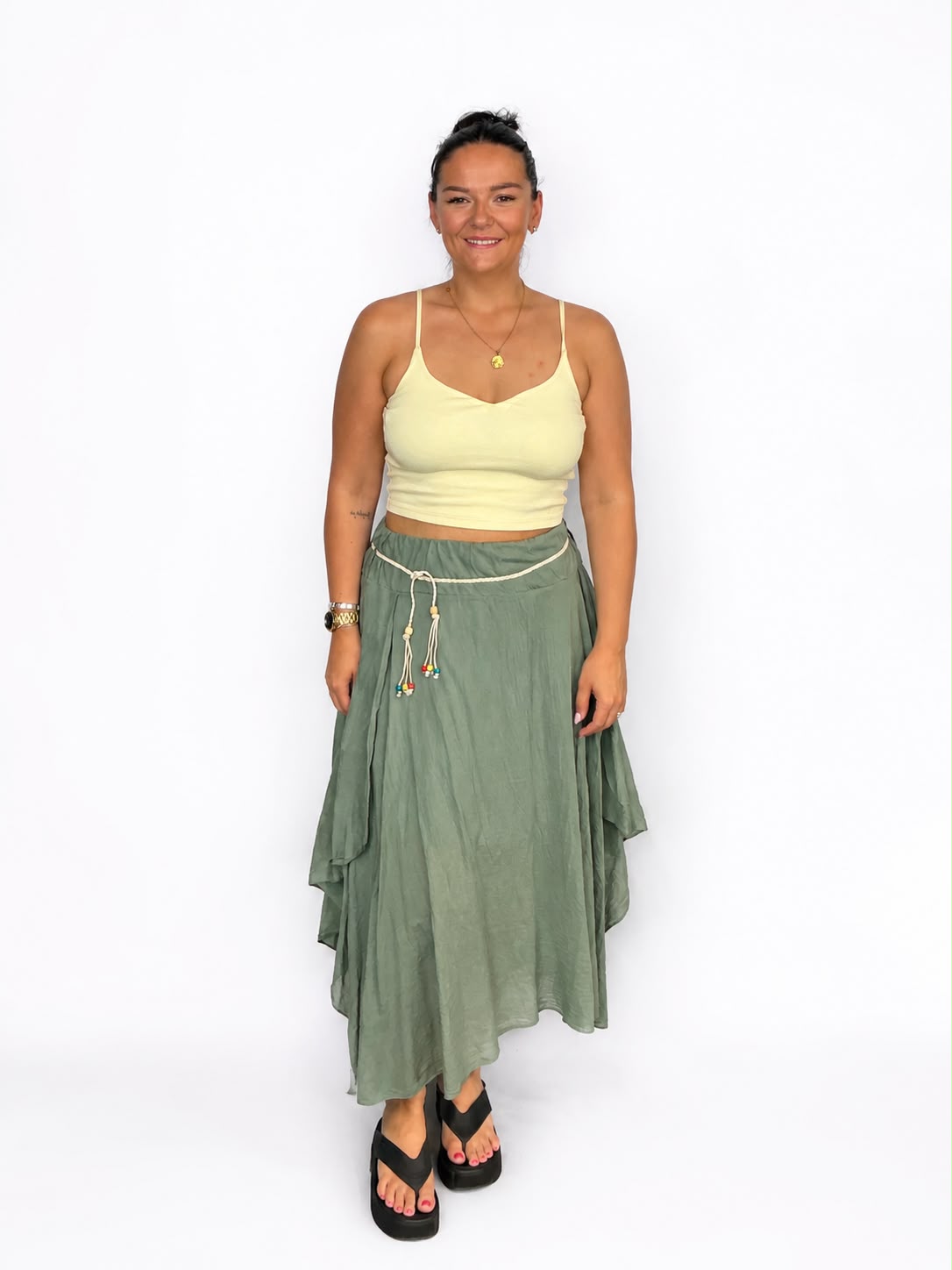 Ladies Italian boho maxi skirt in Khaki with an asymmetric hem, elasticated drawstring waistband and flowing relaxed fit.