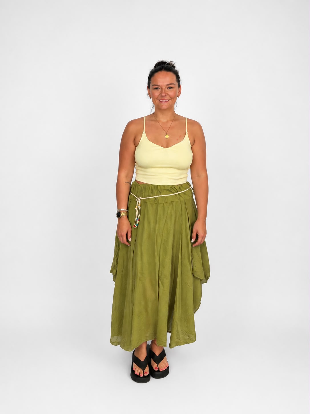 Ladies Italian boho maxi skirt in Lime Green with an asymmetric hem, elasticated drawstring waistband and flowing relaxed fit.