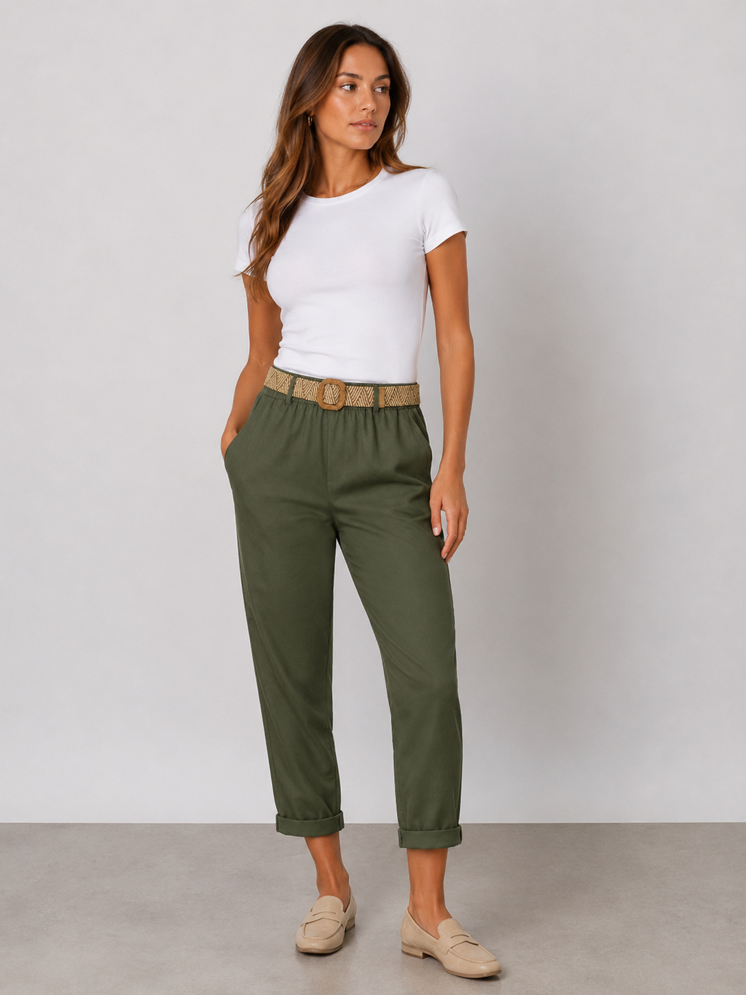 Ladies Italian cropped chino trousers with woven belt in khaki green, styled with rolled cuffs