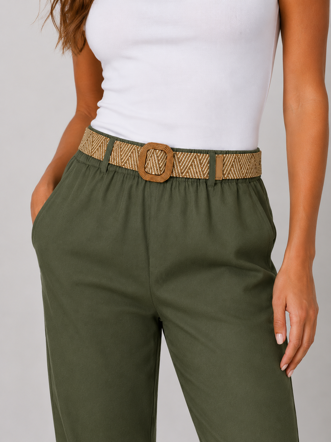 Ladies Italian cropped chino trousers with woven belt in khaki green, styled with rolled cuffs