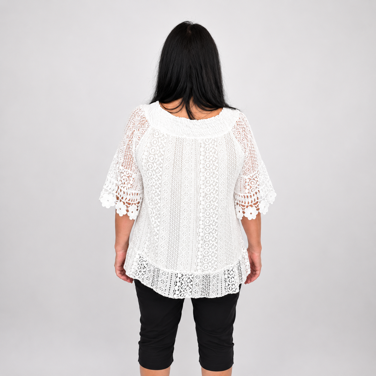 Ladies Italian Daisy Crochet Lace Tunic Top in white with floral crochet lace detail and short scalloped sleeves.
