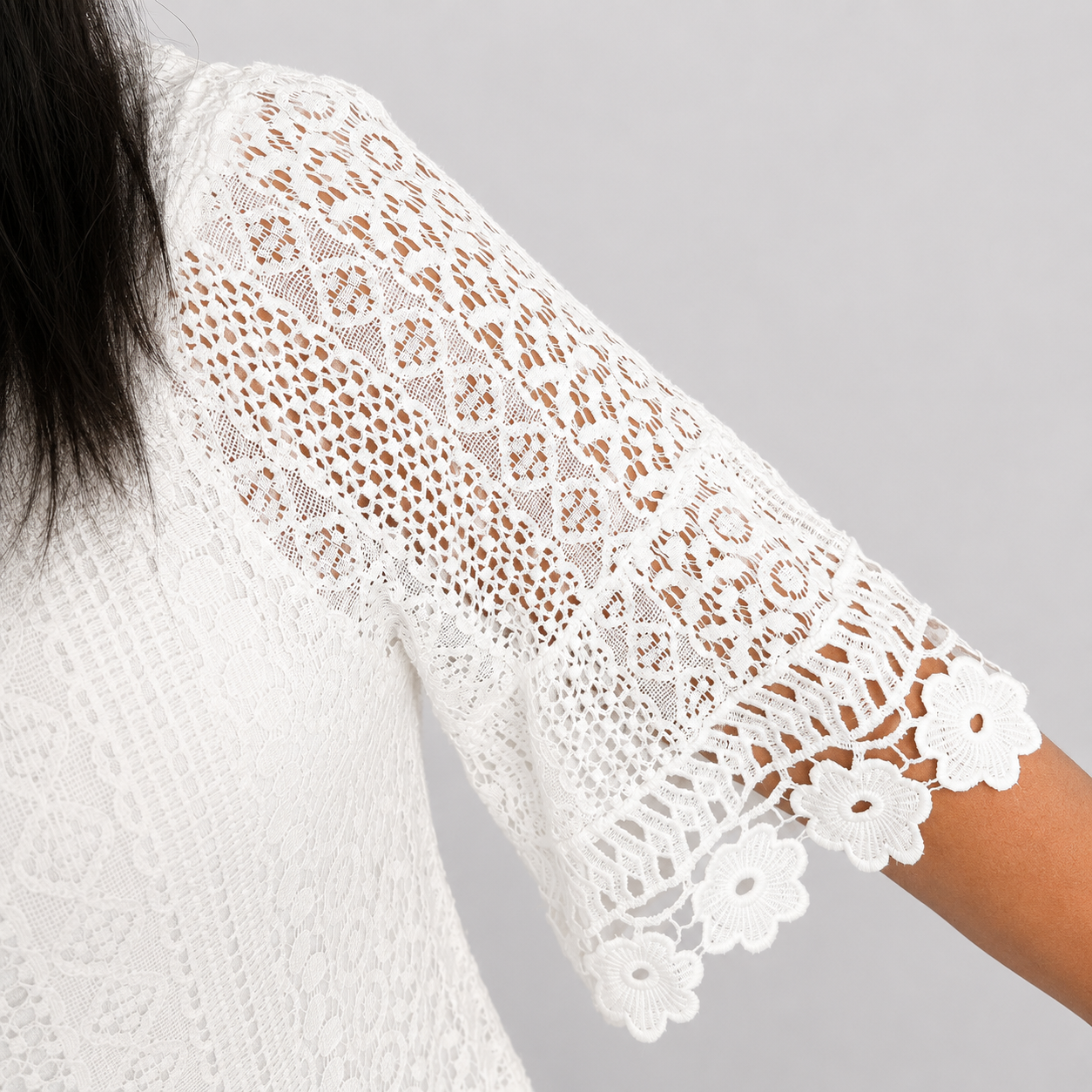 Ladies Italian Daisy Crochet Lace Tunic Top in white with floral crochet lace detail and short scalloped sleeves.