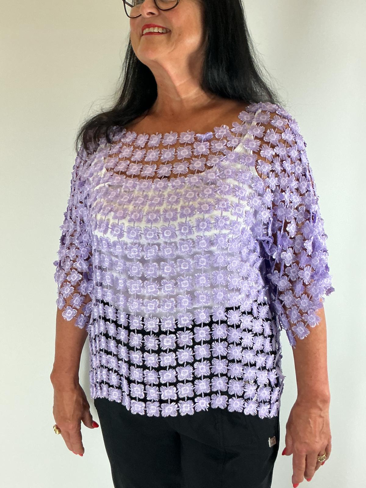 Ladies Lilac semi-sheer floral embroidered top with short sleeves, a relaxed fit and scalloped edges