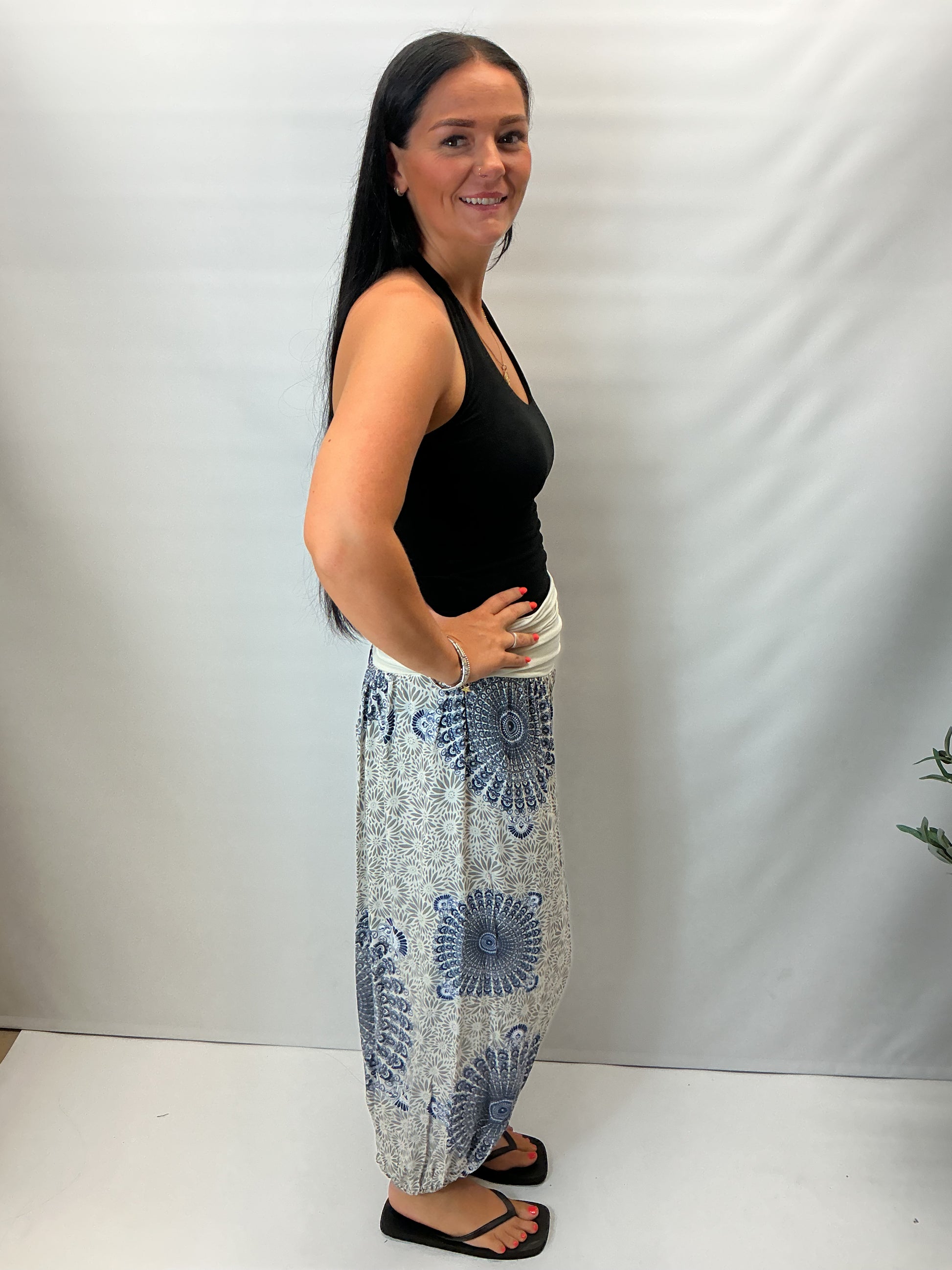 Women's Italian beige mandala print harem trousers with stretch waistband, relaxed balloon leg fit and elasticated cuffs.