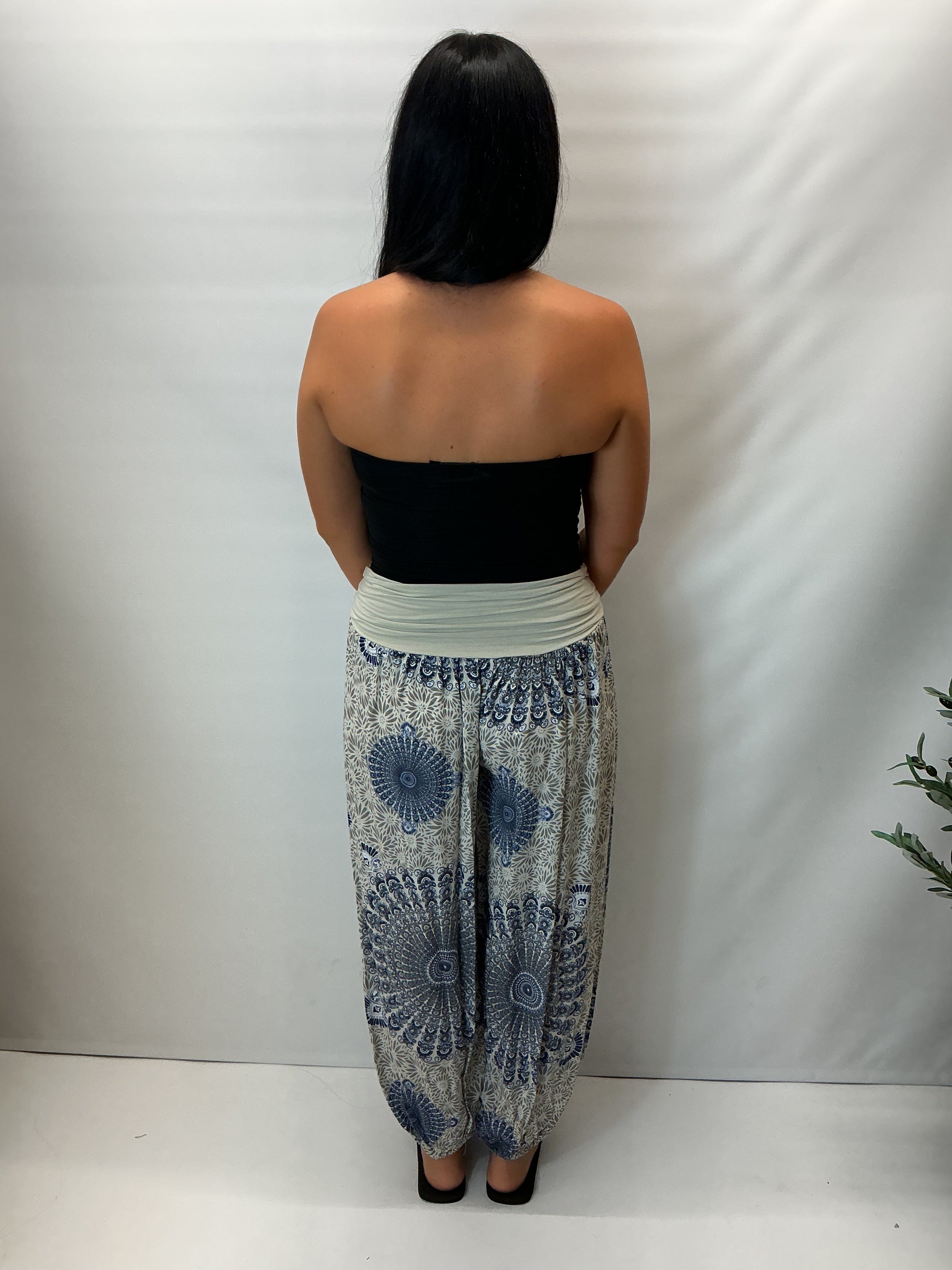 Women's Italian beige mandala print harem trousers with stretch waistband, relaxed balloon leg fit and elasticated cuffs.