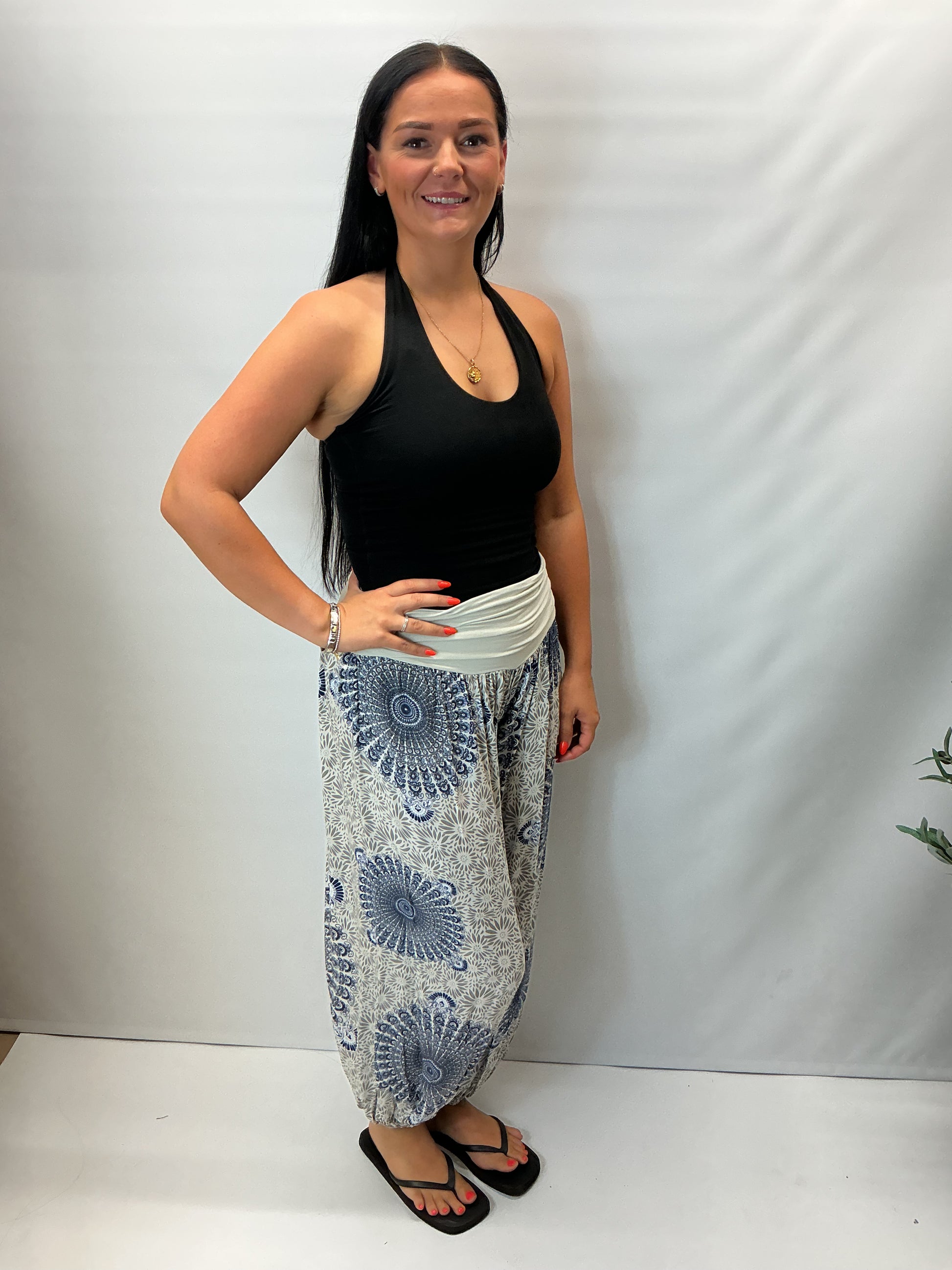 Women's Italian beige mandala print harem trousers with stretch waistband, relaxed balloon leg fit and elasticated cuffs.
