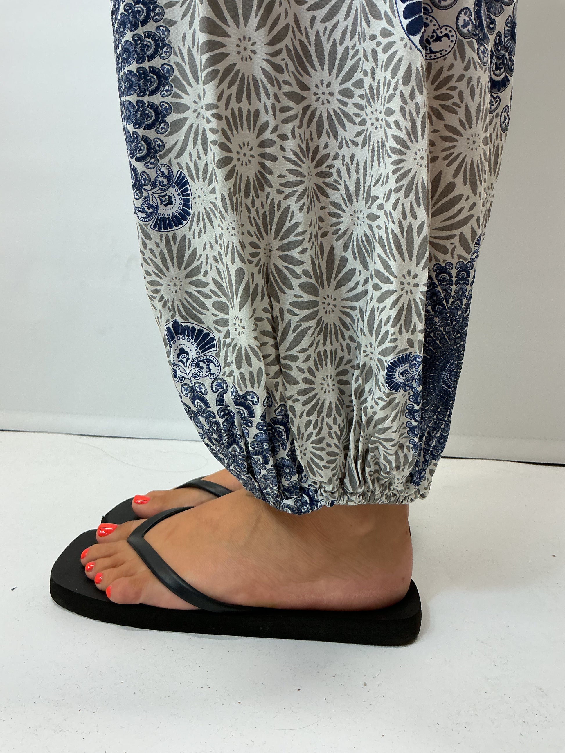 Women's Italian beige mandala print harem trousers with stretch waistband, relaxed balloon leg fit and elasticated cuffs.