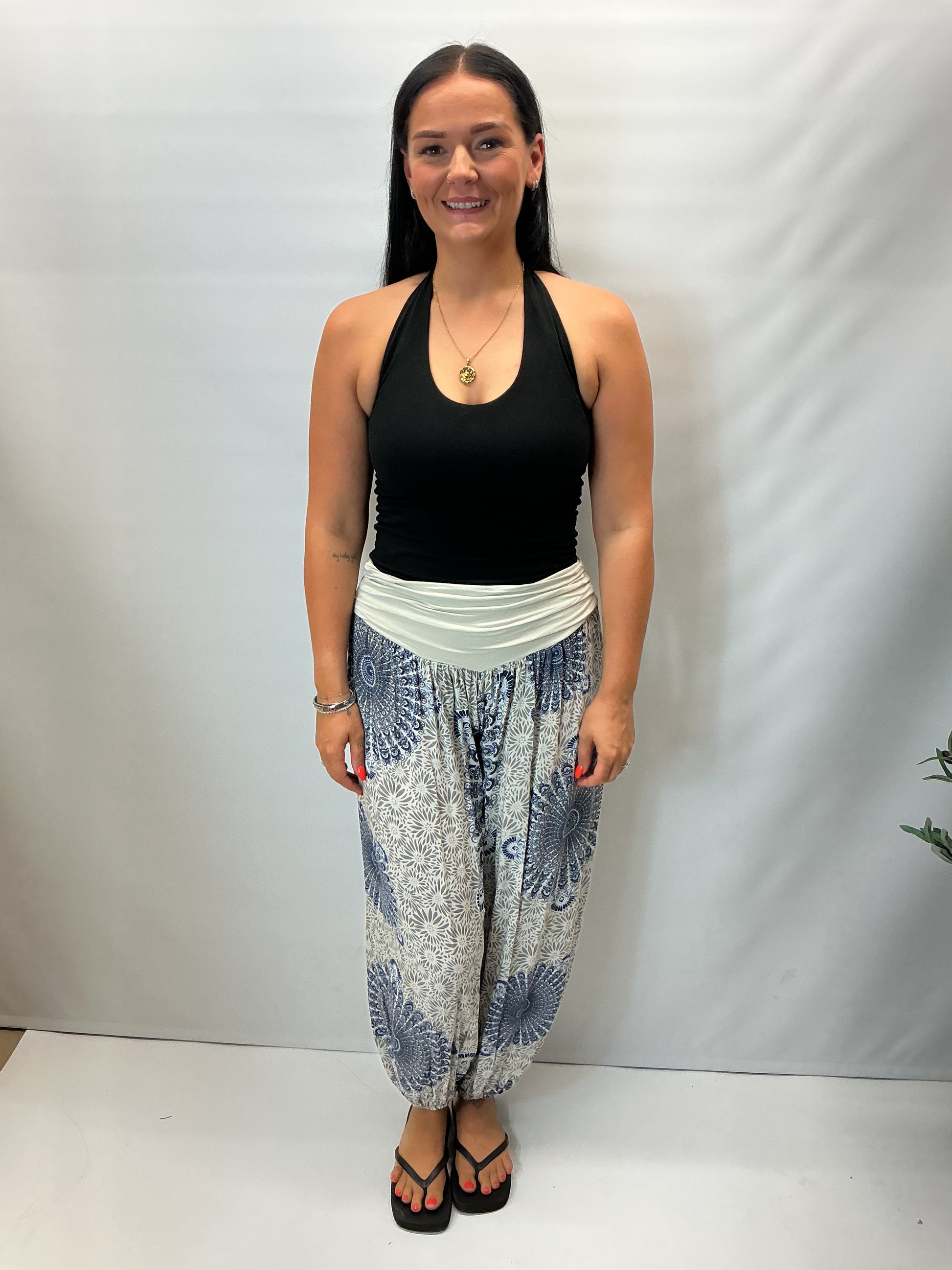 Women's Italian beige mandala print harem trousers with stretch waistband, relaxed balloon leg fit and elasticated cuffs.