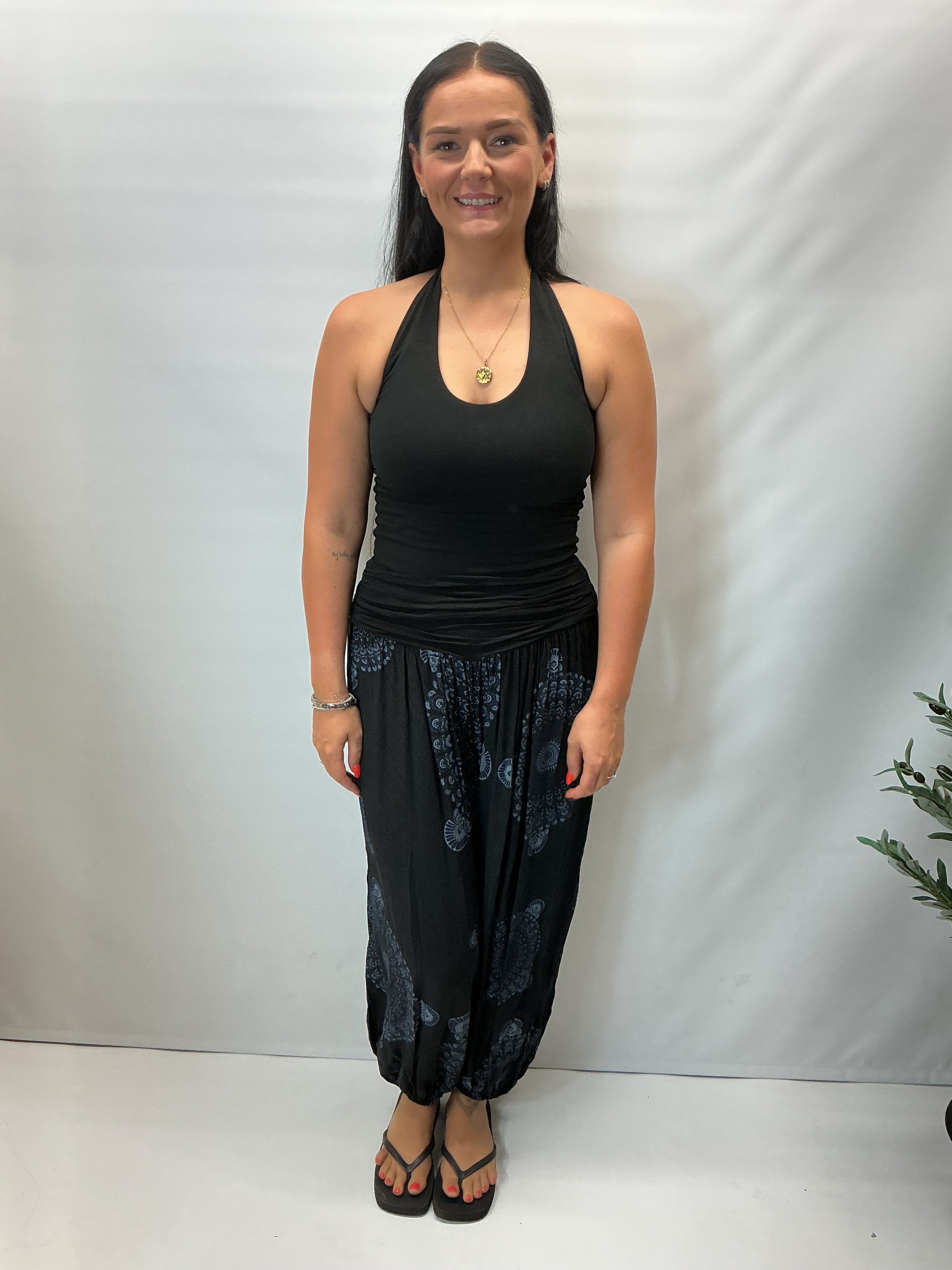Women's Italian Black mandala print harem trousers with stretch waistband, relaxed balloon leg fit and elasticated cuffs.