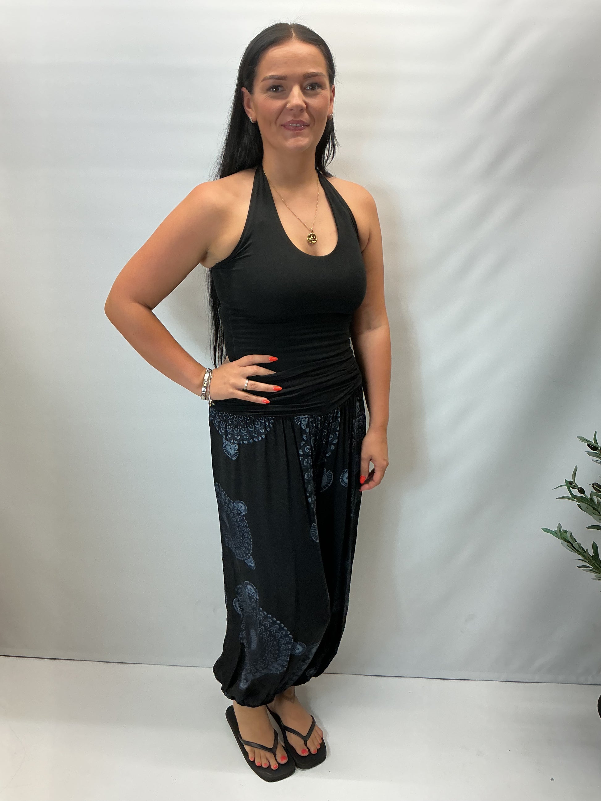 Women's Italian Black mandala print harem trousers with stretch waistband, relaxed balloon leg fit and elasticated cuffs.