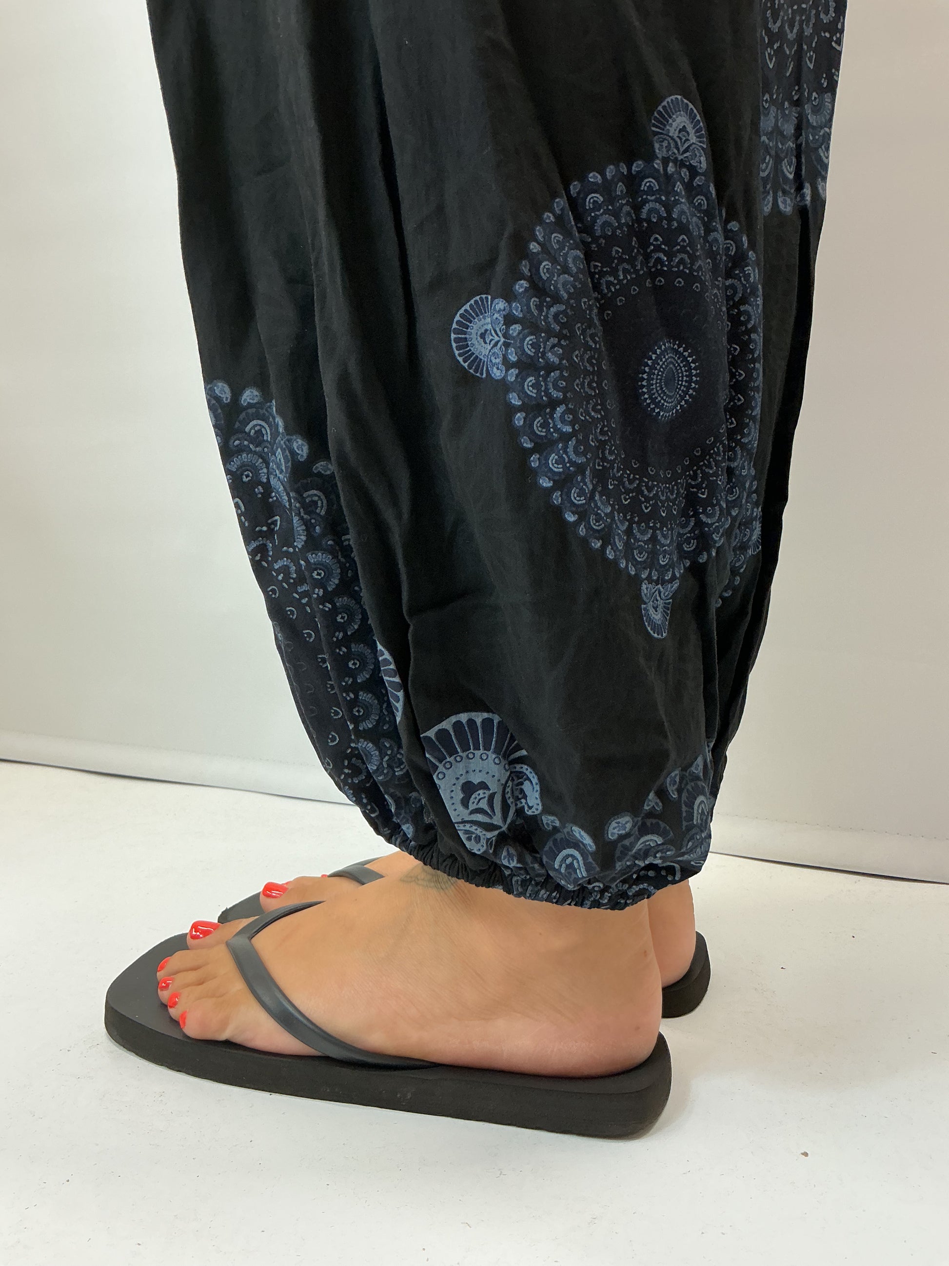 Women's Italian Black mandala print harem trousers with stretch waistband, relaxed balloon leg fit and elasticated cuffs.