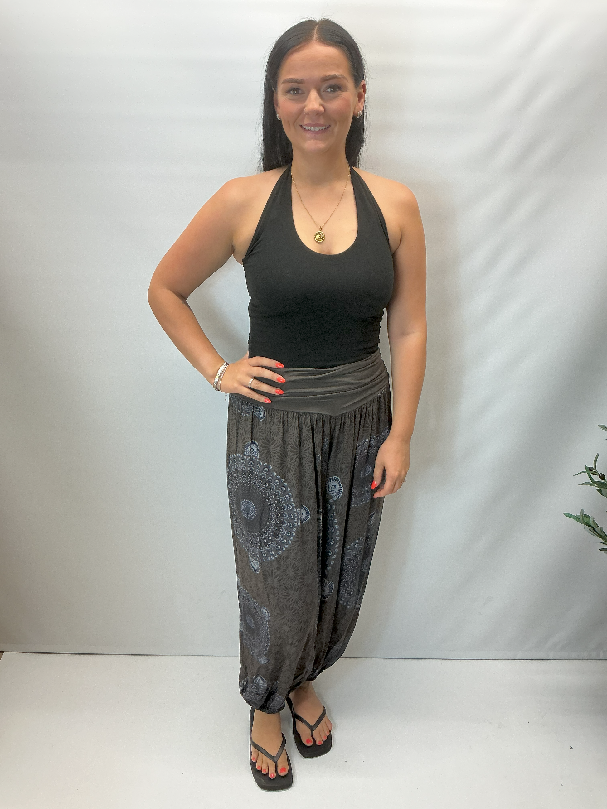 Women's Italian brown mandala print harem trousers with stretch waistband, relaxed balloon leg fit and elasticated cuffs.