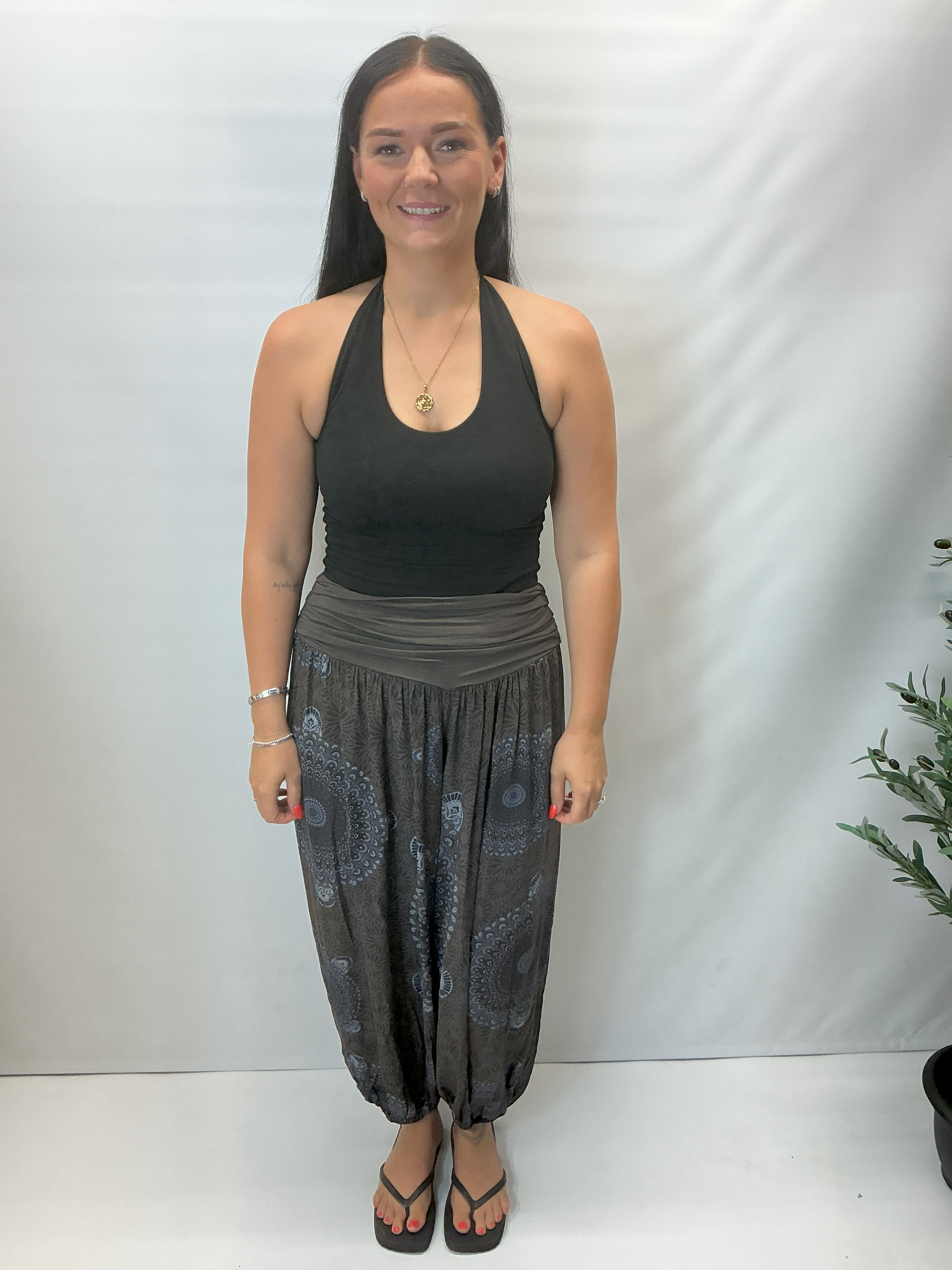 Women's Italian brown mandala print harem trousers with stretch waistband, relaxed balloon leg fit and elasticated cuffs.