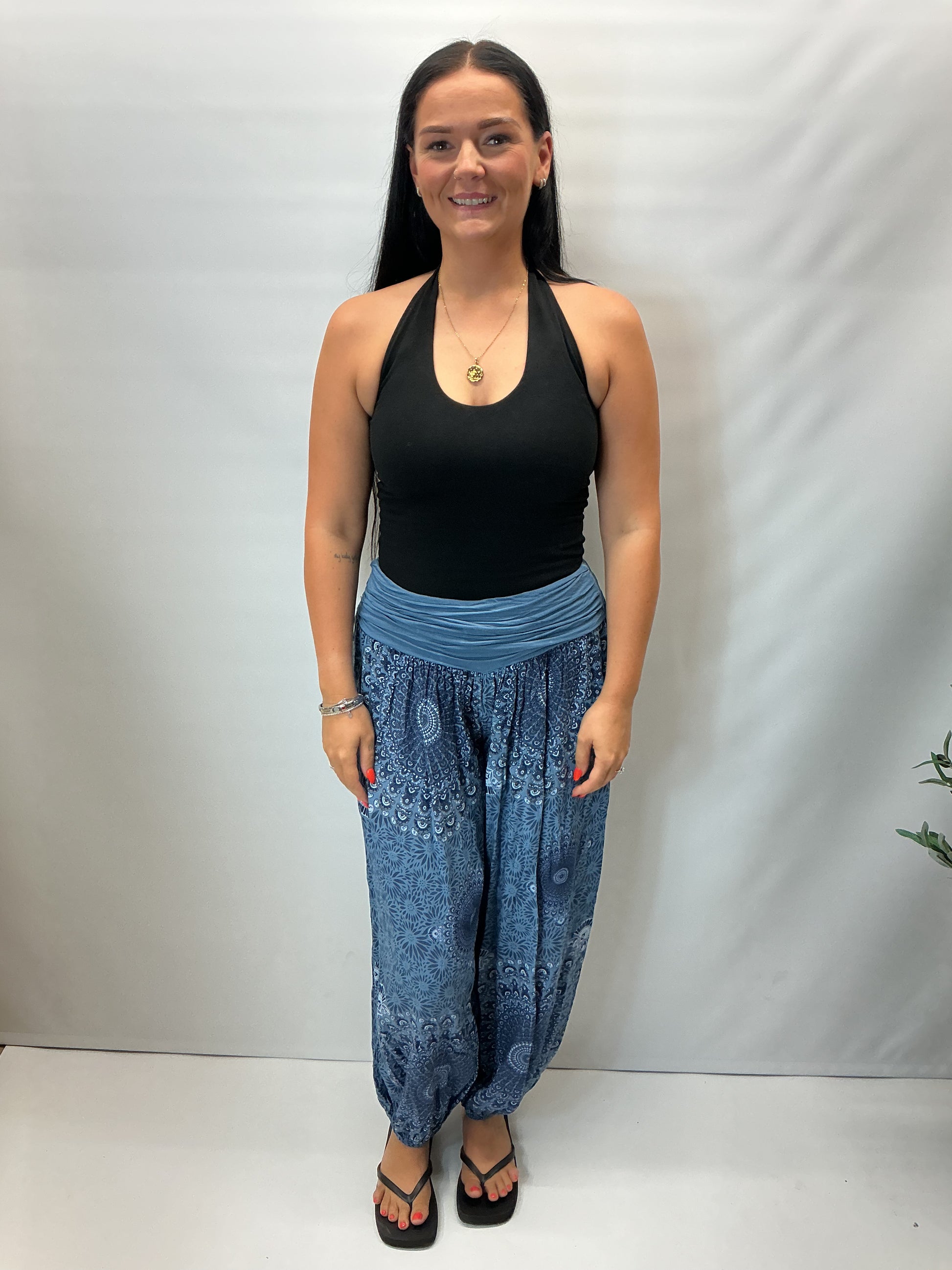 Women's Italian denim blue mandala print harem trousers with stretch waistband, relaxed balloon leg fit and elasticated cuffs.