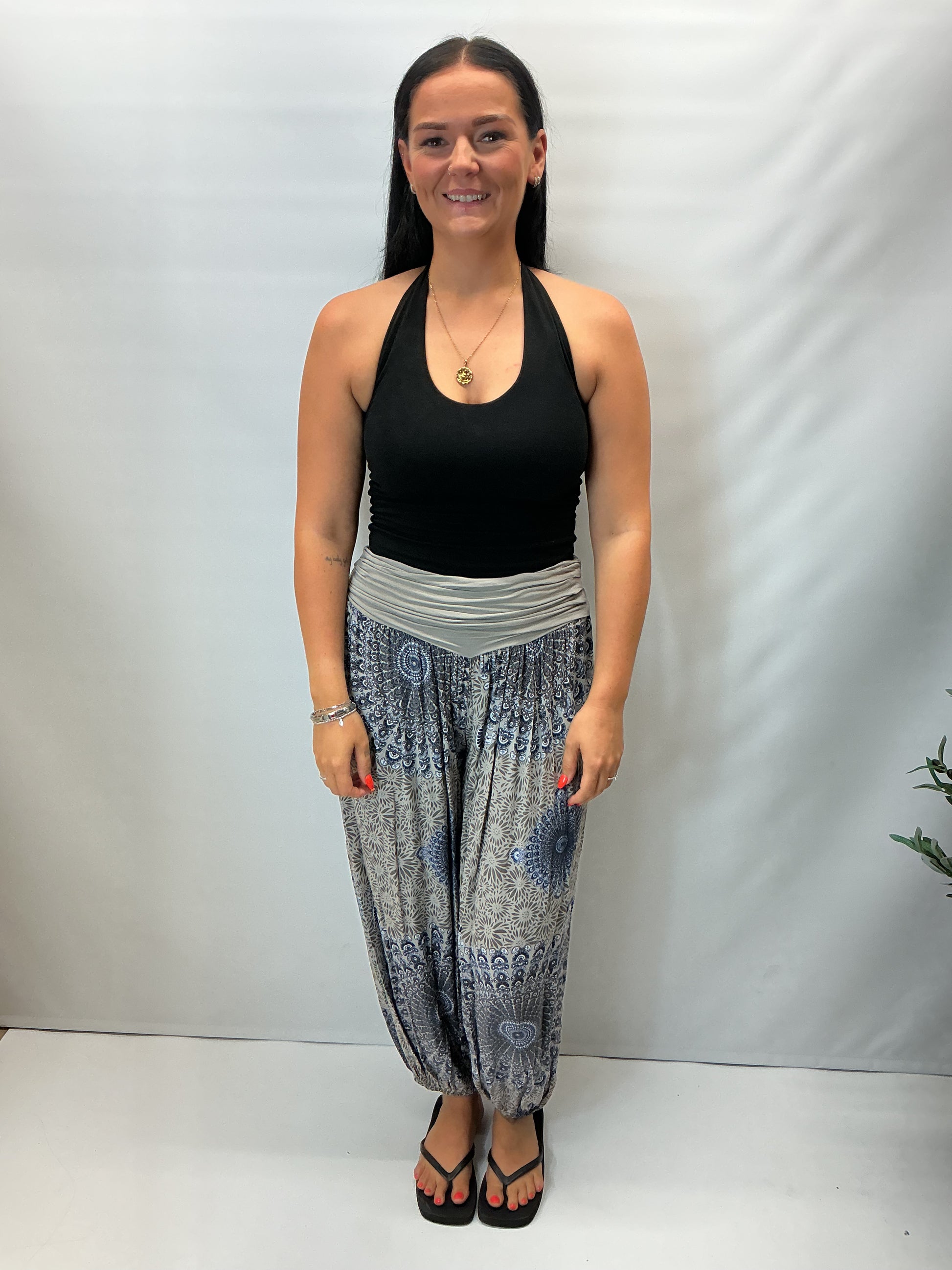 Women's Italian grey mandala print harem trousers with stretch waistband, relaxed balloon leg fit and elasticated cuffs.