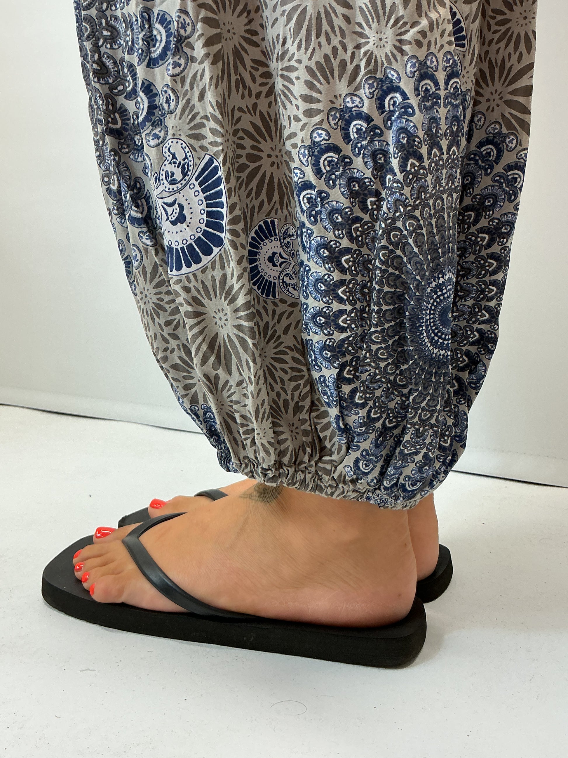 Women's Italian grey mandala print harem trousers with stretch waistband, relaxed balloon leg fit and elasticated cuffs.