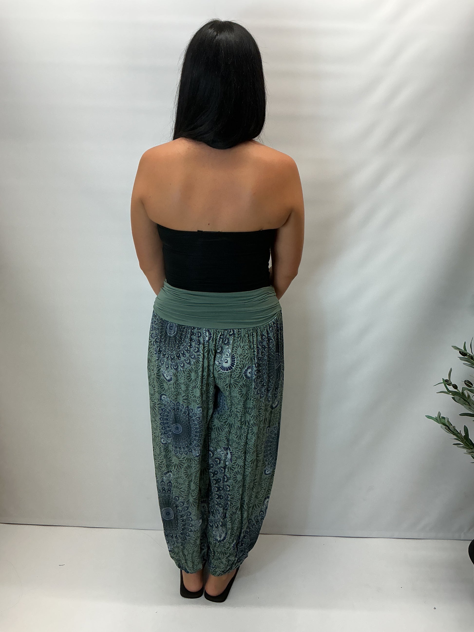 Women's Italian khaki green mandala print harem trousers with stretch waistband, relaxed balloon leg fit and elasticated cuffs.