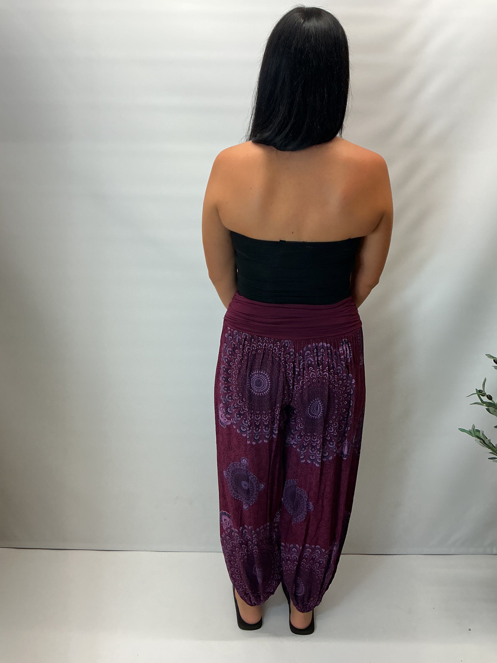 Women's Italian maroon mandala print harem trousers with stretch waistband, relaxed balloon leg fit and elasticated cuffs.