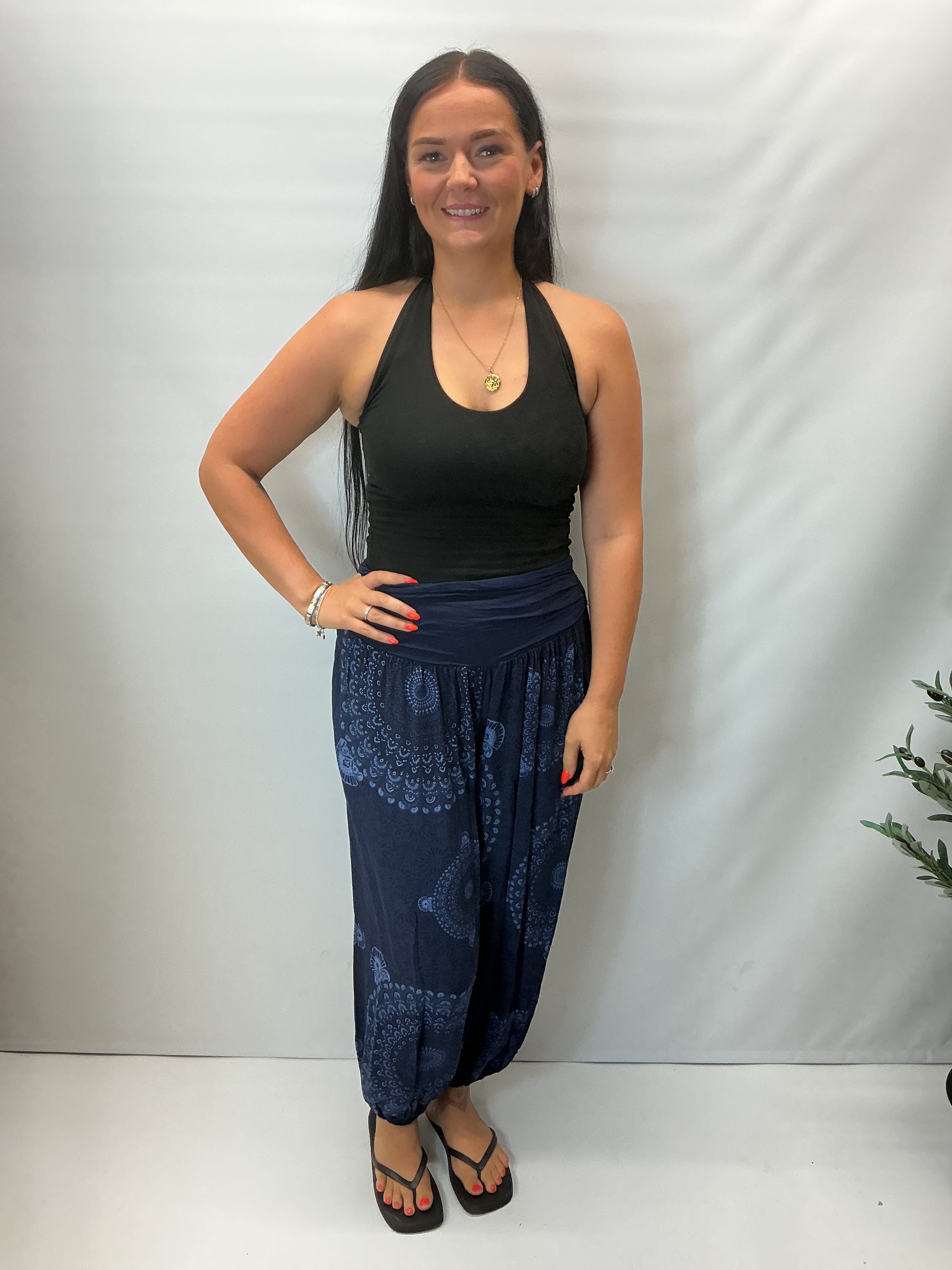 Women's Italian navy mandala print harem trousers with stretch waistband, relaxed balloon leg fit and elasticated cuffs.