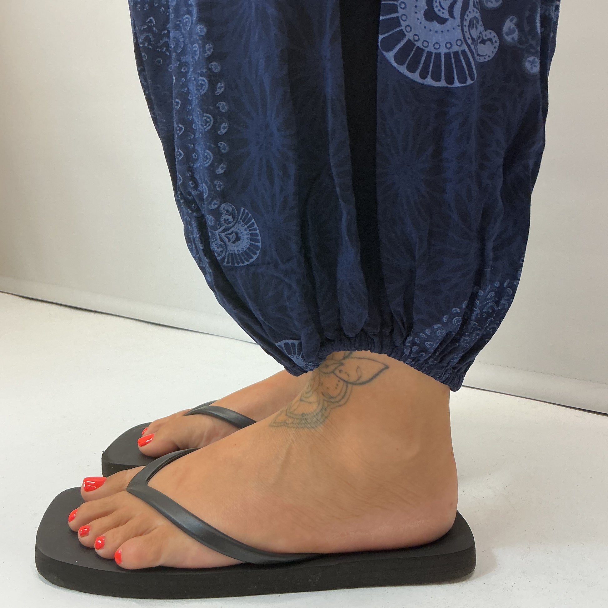 Women's Italian navy mandala print harem trousers with stretch waistband, relaxed balloon leg fit and elasticated cuffs.