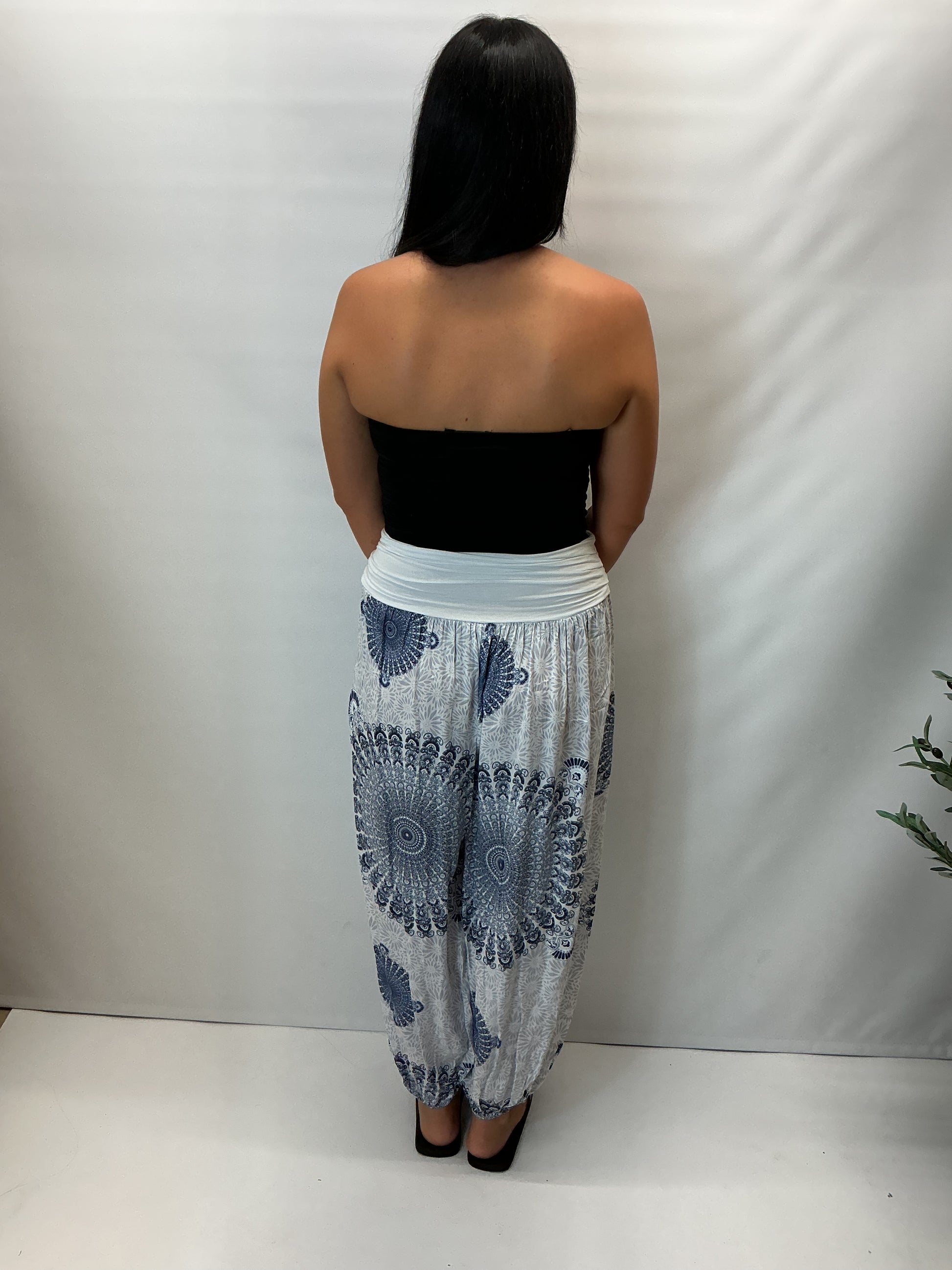 Women's Italian white mandala print harem trousers with stretch waistband, relaxed balloon leg fit and elasticated cuffs.