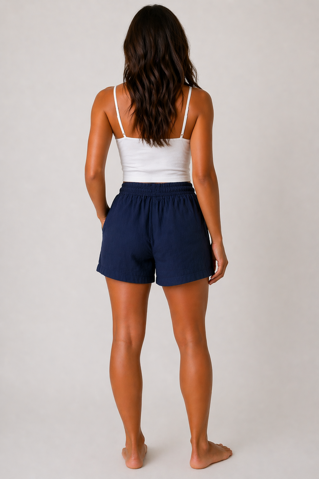 relaxed-fit linen blend shorts with elastic waistband, adjustable drawstring, and side pockets in multiple colours including beige, black, khaki, lilac, navy, and white. Front and back product views shown on a neutral background.