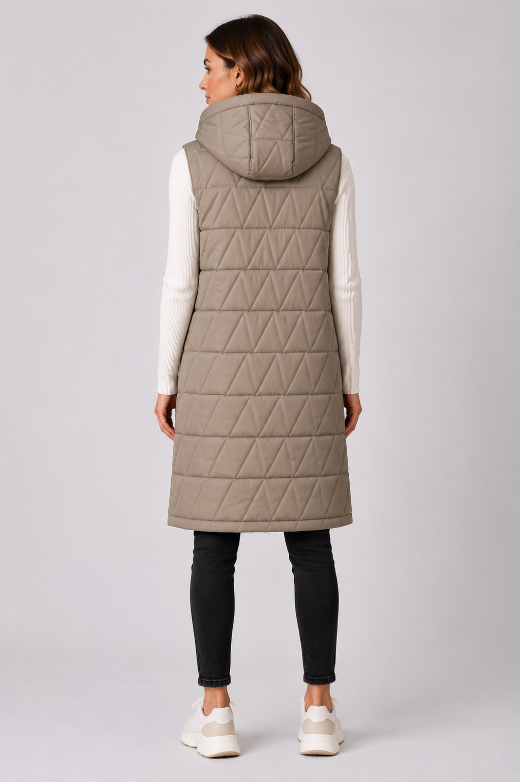 Ladies longline quilted bodywarmer in beige with hood and snap-button front