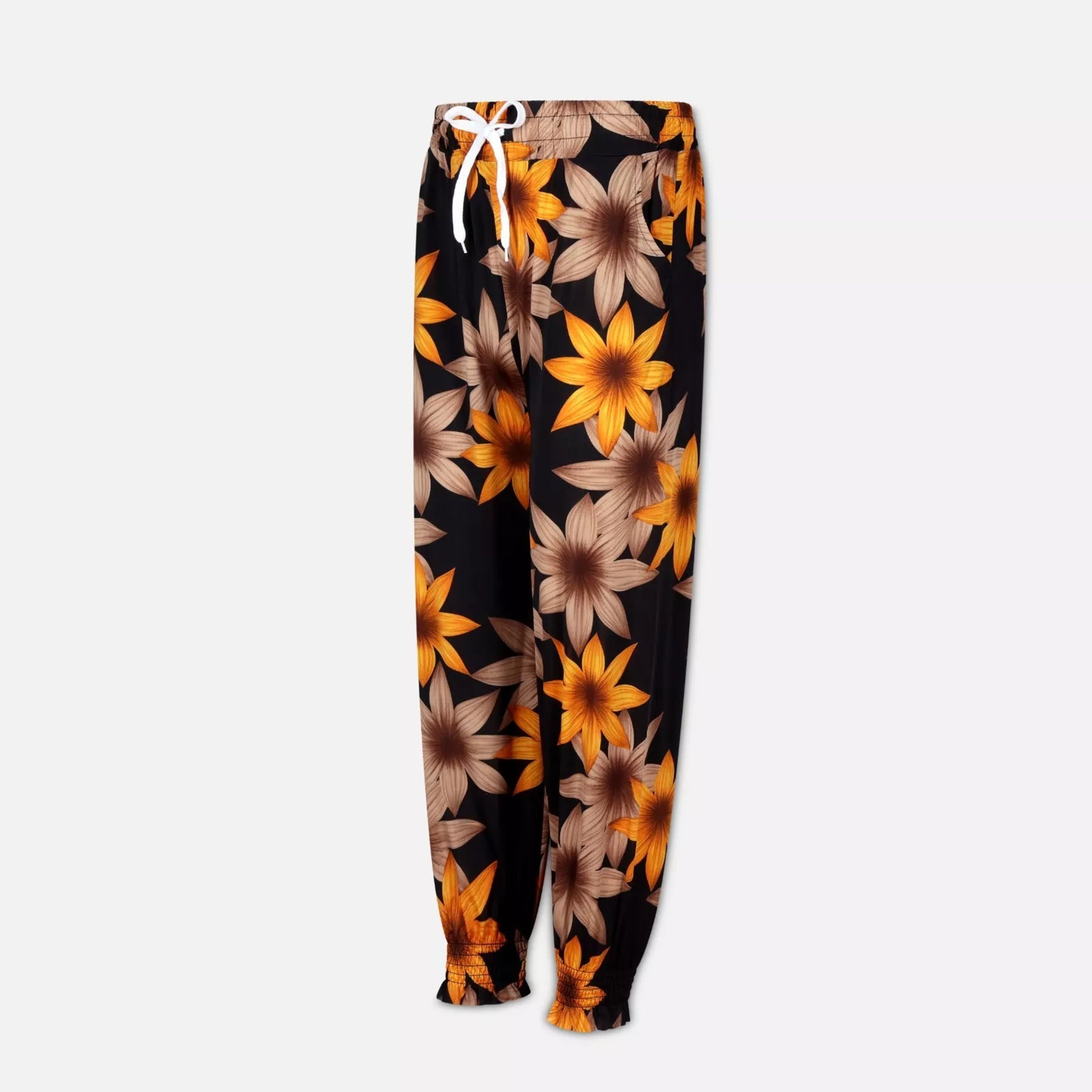 Ladies JDN branded palazzo trousers in black with yellow and beige print and white drawstring waistband