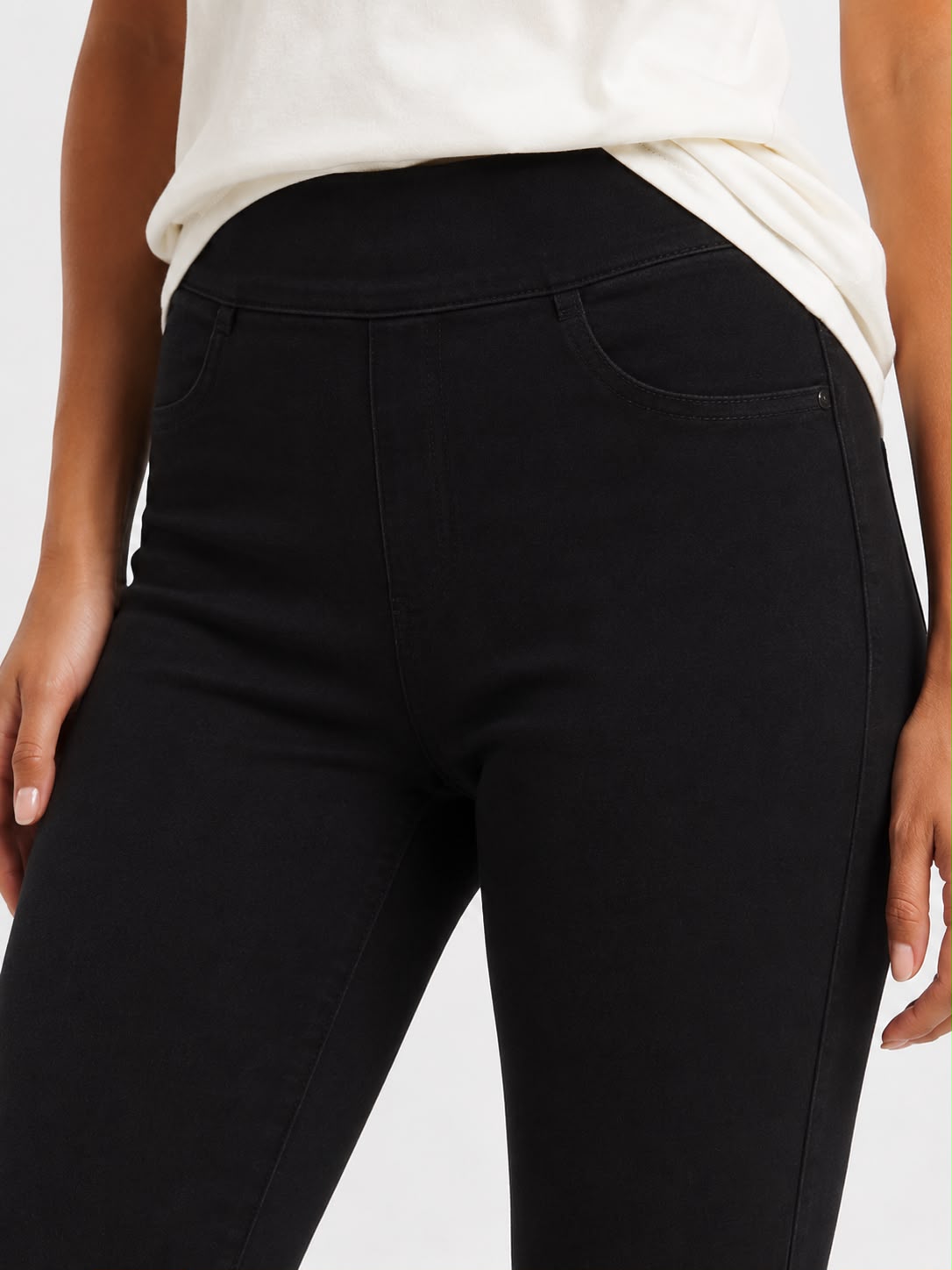 Women’s black high waisted denim jeggings with a slim fit, stretch fabric and five-pocket design