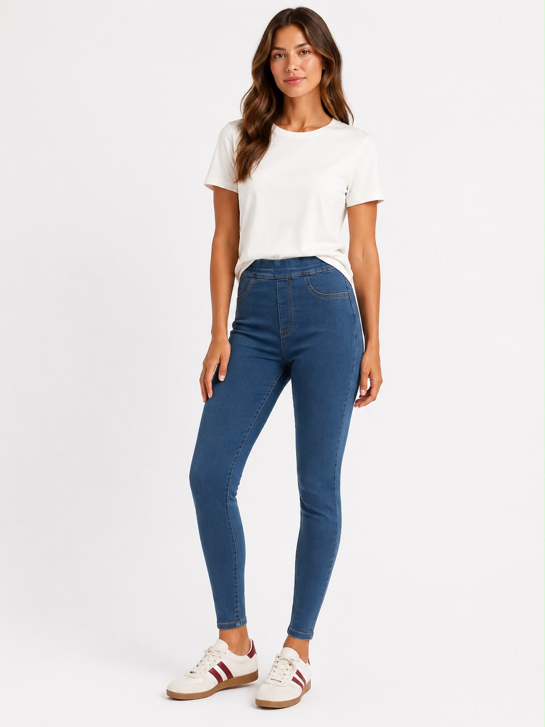 Women’s blue high waisted denim jeggings with a slim fit, stretch fabric and five-pocket design.