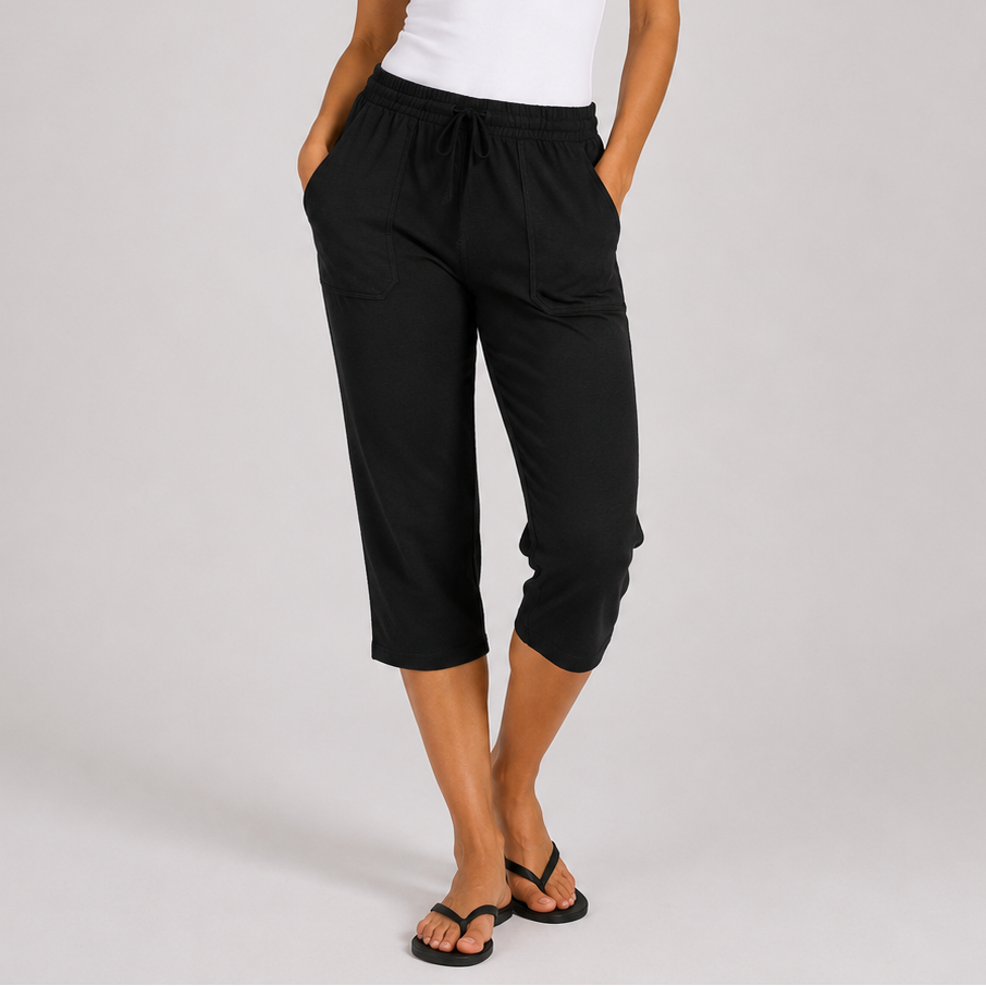 Women's black soft touch cropped lounge trousers with pockets. Comfortable elasticated waist, drawstring fit and breathable fabric for everyday wear.