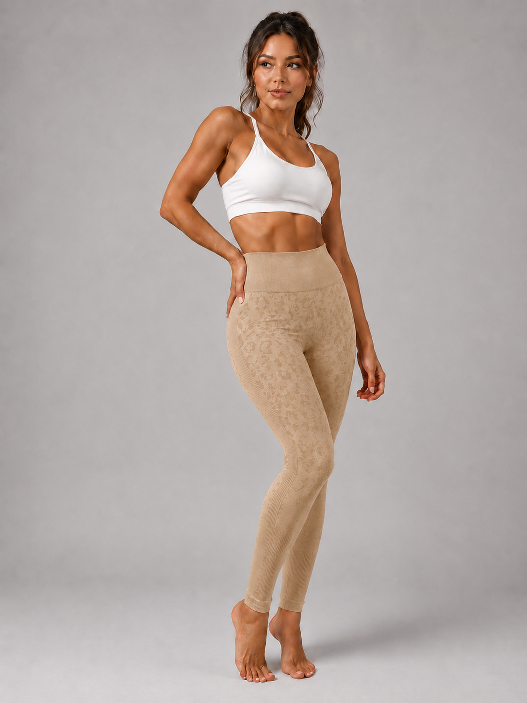 Womens beige leopard print seamless high waisted gym leggings with textured jacquard pattern and ribbed waistband activewear tights