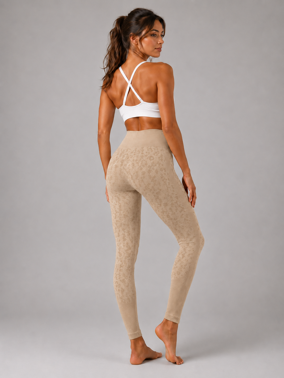 Womens beige leopard print seamless high waisted gym leggings with textured jacquard pattern and ribbed waistband activewear tights