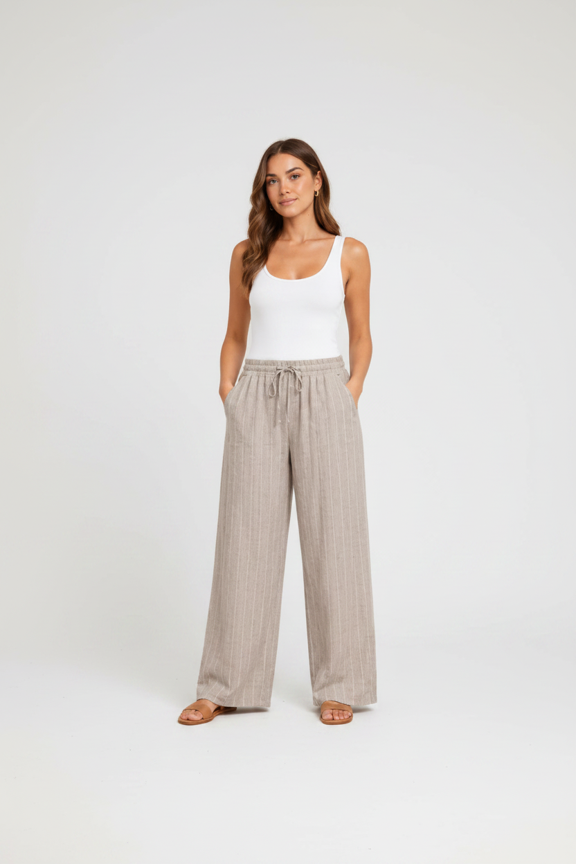 Ladies linen mix wide leg trousers with elasticated drawstring waist, side pockets, and subtle vertical stripe texture. Lightweight summer trousers shown in six colours: light beige, pale blue, soft mint, light grey, blush pink, and cream.