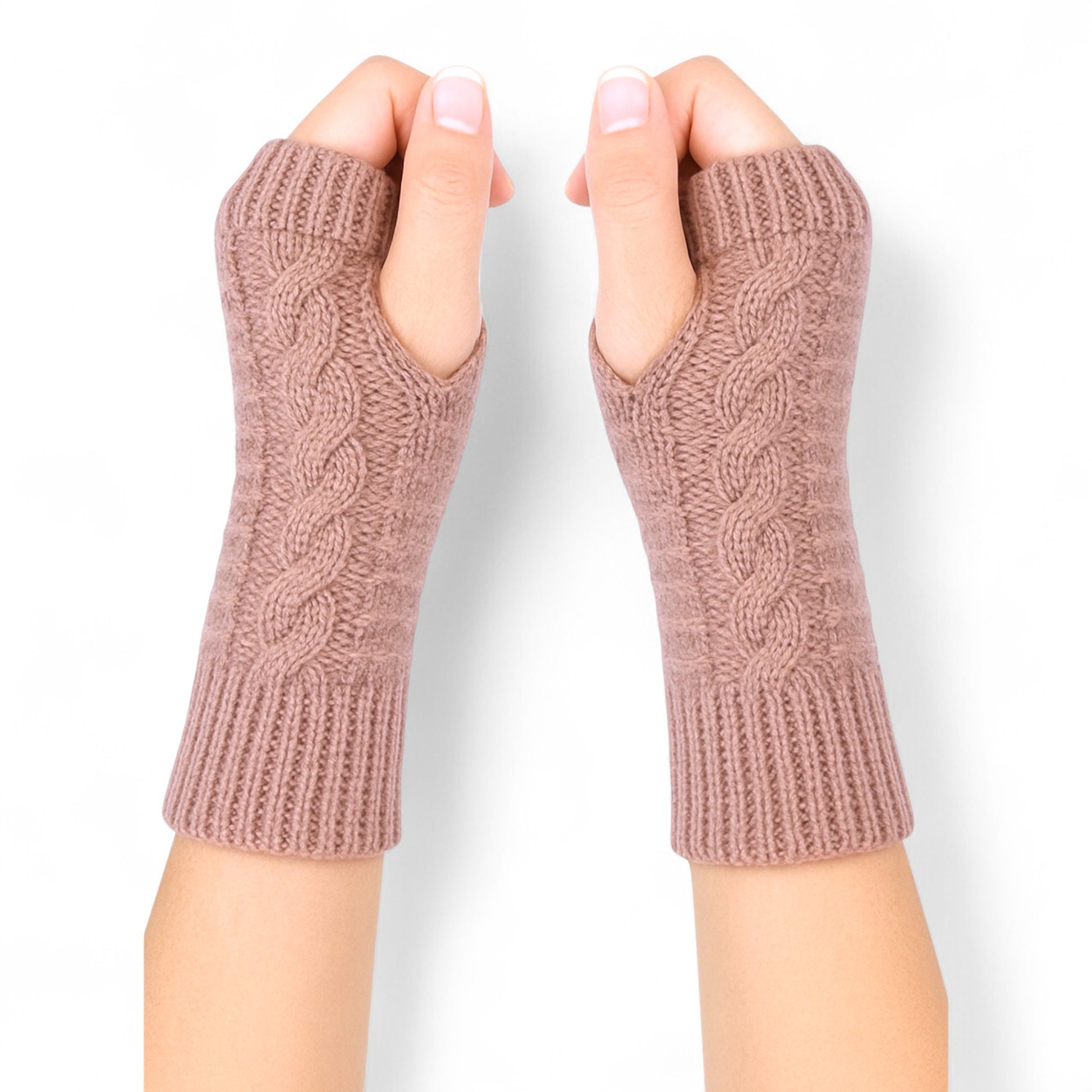 Knitted fingerless mittens in dusky pink with classic cable knit design for warmth and style