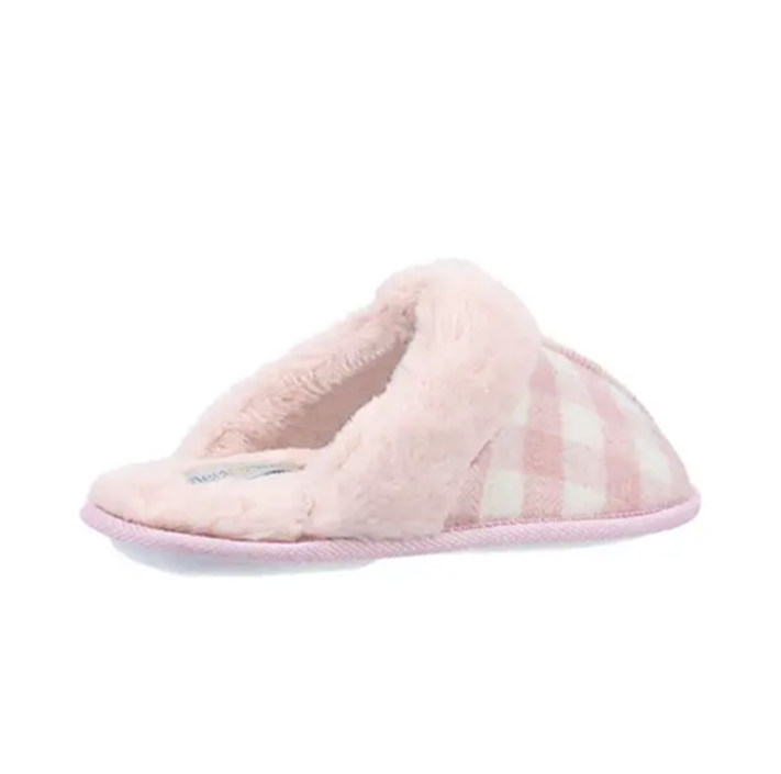 Fleet & Foster luxury pink check mule slippers for women in pink and grey with faux fur lining and cushioned comfort sole displayed in cosy indoor lifestyle setting
