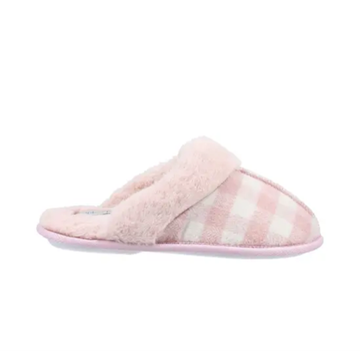 Fleet & Foster luxury pink check mule slippers for women in pink and grey with faux fur lining and cushioned comfort sole displayed in cosy indoor lifestyle setting