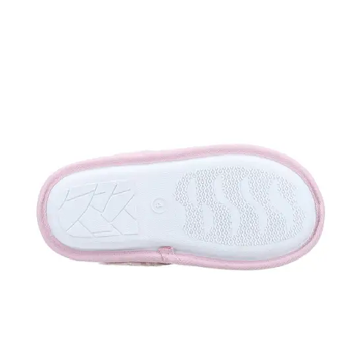 Fleet & Foster luxury pink check mule slippers for women in pink and grey with faux fur lining and cushioned comfort sole displayed in cosy indoor lifestyle setting