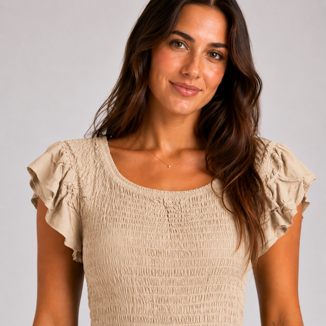 Beige womens shirred jumpsuit with puff sleeves and wide-leg cropped