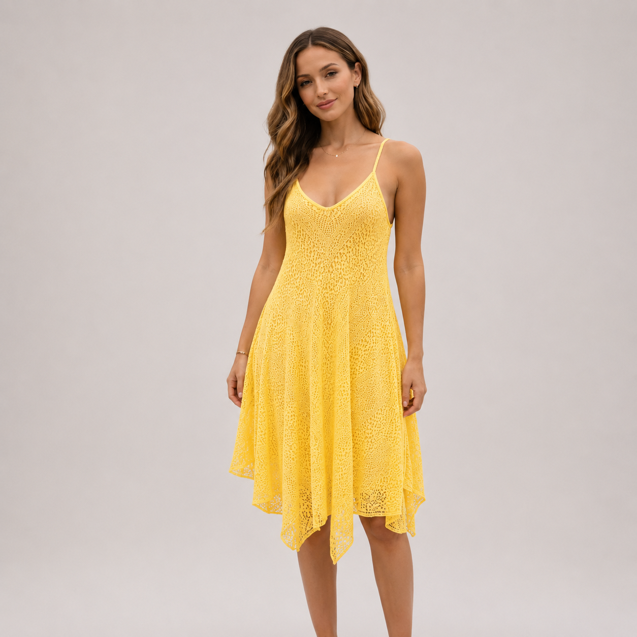 Elevate your warm-weather wardrobe with this asymmetrical lace slip dress, designed for effortless style and breathable comfort. Crafted from lightweight lace fabric, this V-neck lace sundress features a relaxed, flowy silhouette that drapes beautifully on the body. The delicate lace detailing and adjustable spaghetti straps create a flattering, feminine look perfect for any occasion.

The asymmetrical hemline adds soft movement and a modern touch, making this dress ideal for everything from beach days and 