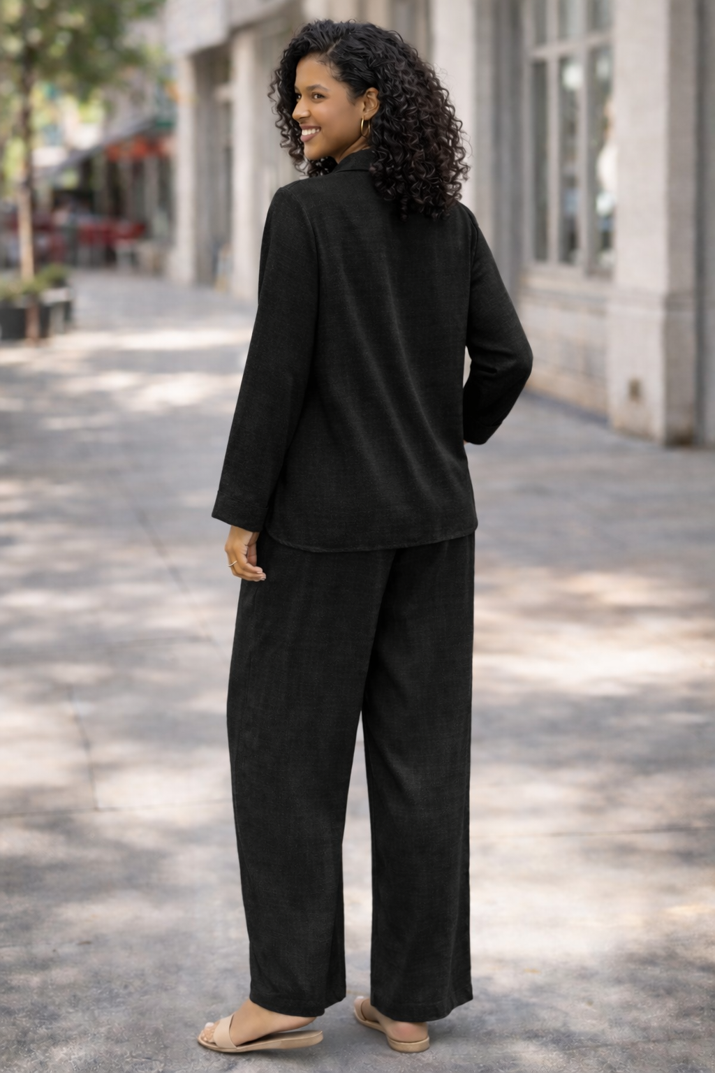 Stay effortlessly stylish with this women’s two piece lounge set, featuring a relaxed fit button-up shirt and wide leg trousers. Designed in a breathable linen-look fabric, this matching co-ord set is perfect for casual wear, holidays, travel, summer outfits, or comfortable everyday styling.