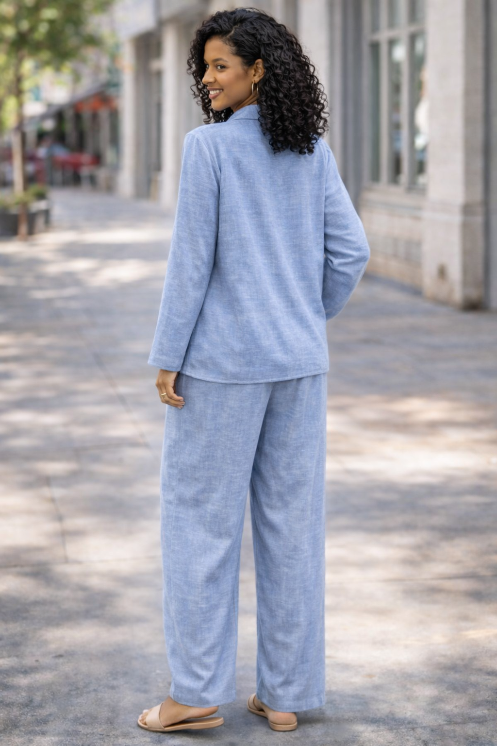 Stay effortlessly stylish with this women’s two piece lounge set, featuring a relaxed fit button-up shirt and wide leg trousers. Designed in a breathable linen-look fabric, this matching co-ord set is perfect for casual wear, holidays, travel, summer outfits, or comfortable everyday styling.