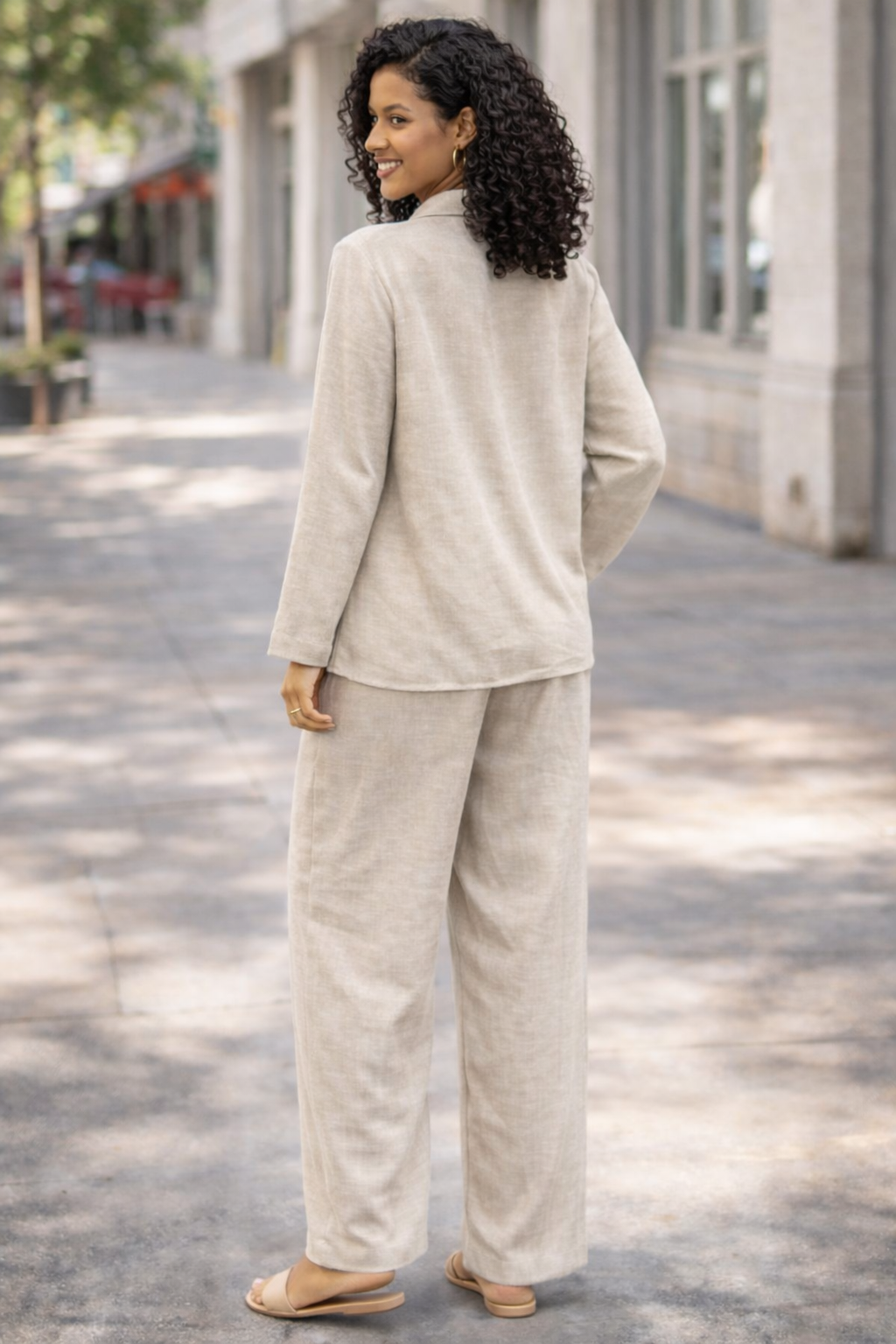 Stay effortlessly stylish with this women’s two piece lounge set, featuring a relaxed fit button-up shirt and wide leg trousers. Designed in a breathable linen-look fabric, this matching co-ord set is perfect for casual wear, holidays, travel, summer outfits, or comfortable everyday styling.