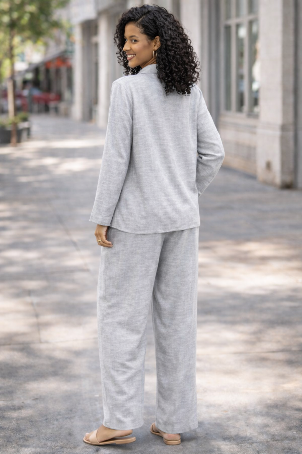 Stay effortlessly stylish with this women’s two piece lounge set, featuring a relaxed fit button-up shirt and wide leg trousers. Designed in a breathable linen-look fabric, this matching co-ord set is perfect for casual wear, holidays, travel, summer outfits, or comfortable everyday styling.