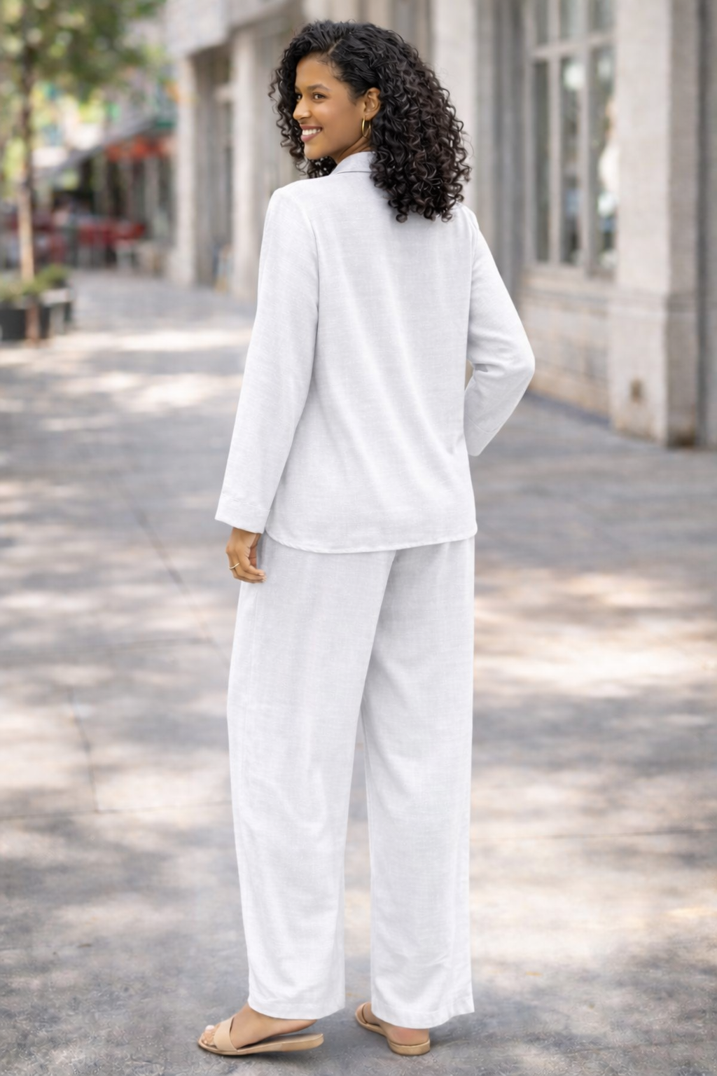 Stay effortlessly stylish with this women’s two piece lounge set, featuring a relaxed fit button-up shirt and wide leg trousers. Designed in a breathable linen-look fabric, this matching co-ord set is perfect for casual wear, holidays, travel, summer outfits, or comfortable everyday styling.