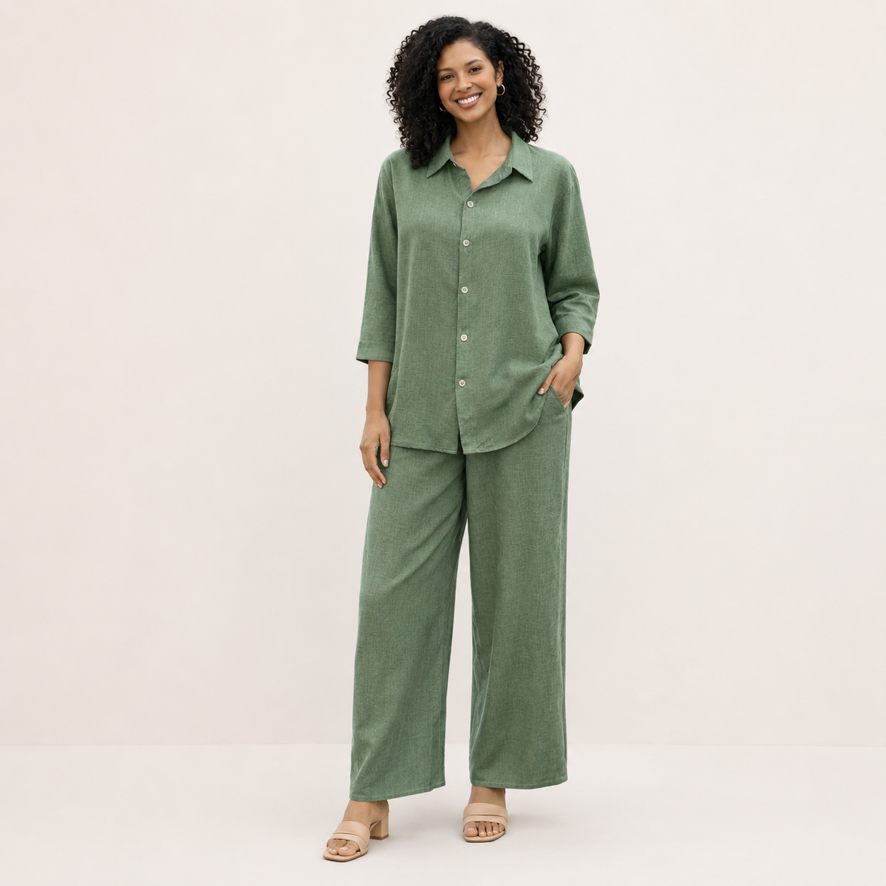 Stay effortlessly stylish with this women’s two piece lounge set, featuring a relaxed fit button-up shirt and wide leg trousers. Designed in a breathable linen-look fabric, this matching co-ord set is perfect for casual wear, holidays, travel, summer outfits, or comfortable everyday styling.
