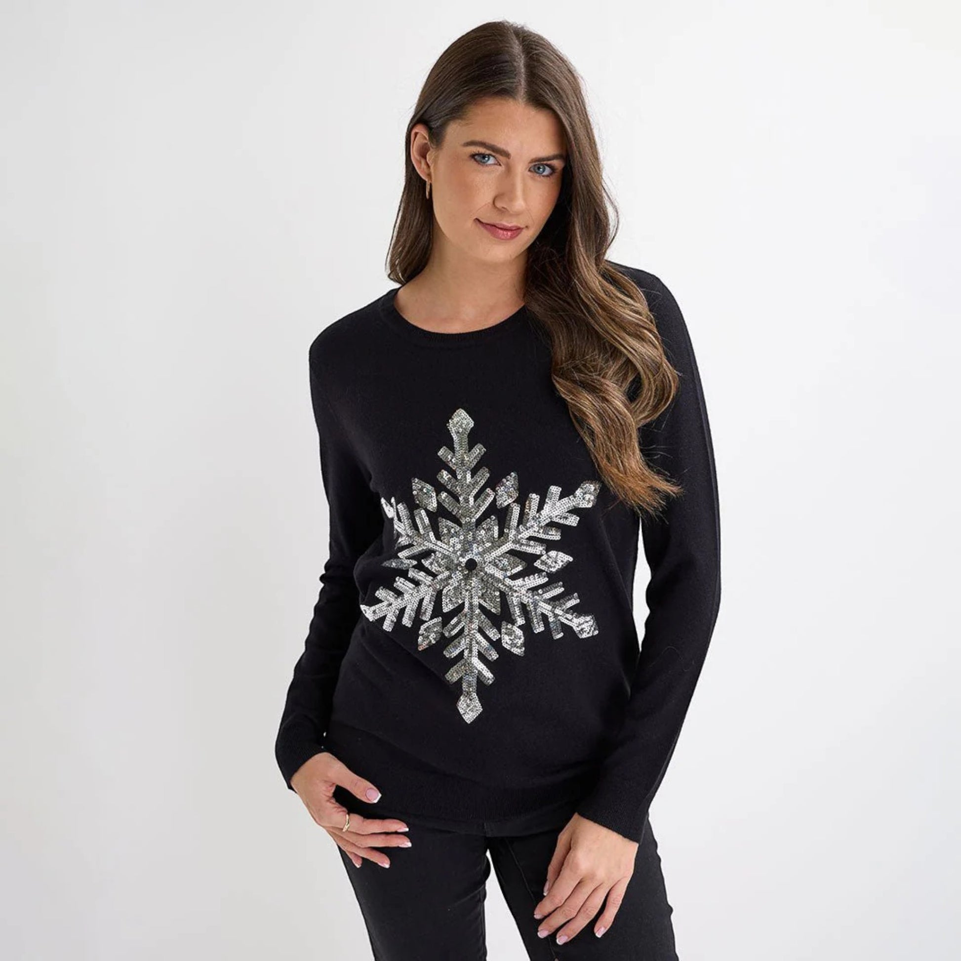 Ladies black Christmas jumper with large silver sequin snowflake design, long sleeves and festive xmas style.