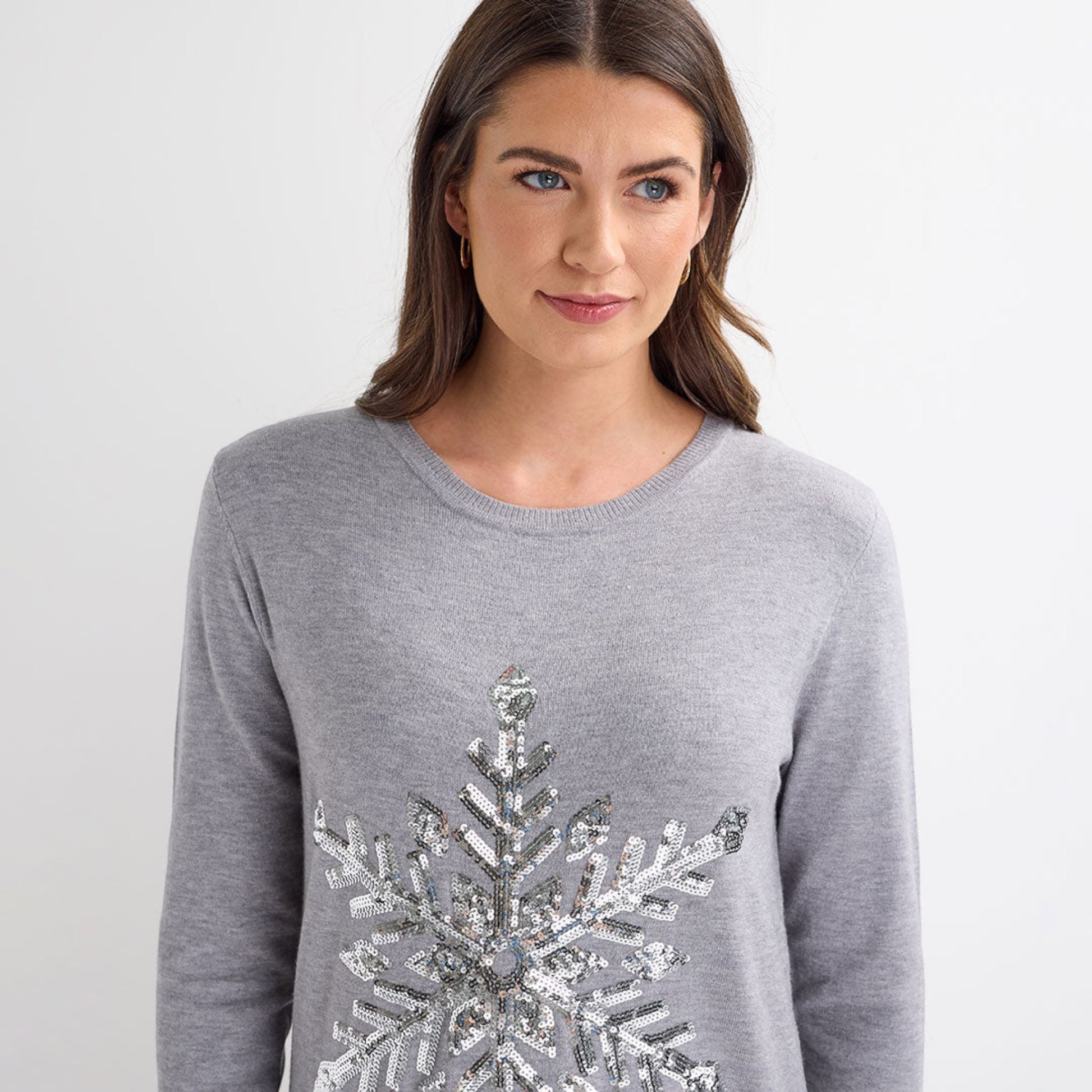 Ladies grey Christmas jumper with large silver sequin snowflake design, long sleeves and festive xmas style.