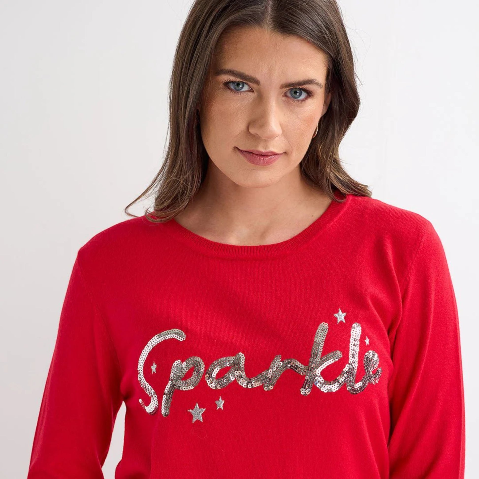 Ladies red jumper with silver sequin ‘sparkle’ slogan, long sleeves and a festive xmas style.